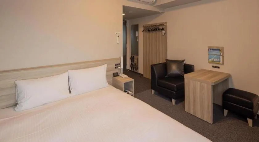 Bed in Hotel Route Inn Miyakonojo