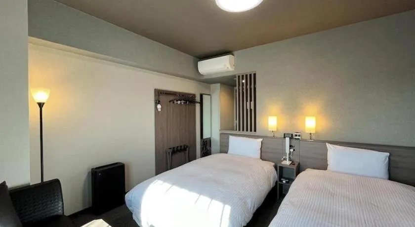 Bed in Hotel Route Inn Miyakonojo