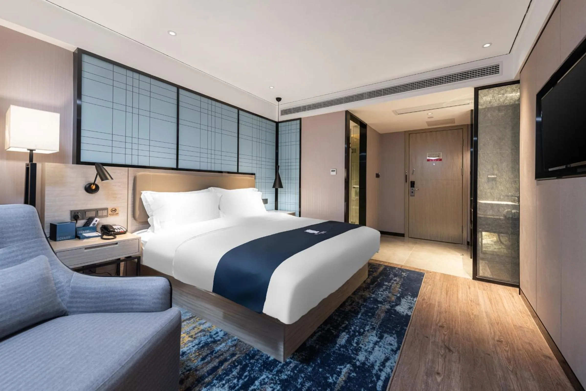 Bed in Echarm Hotel Yangshuo West Stree 宜尚酒店 阳朔西街店