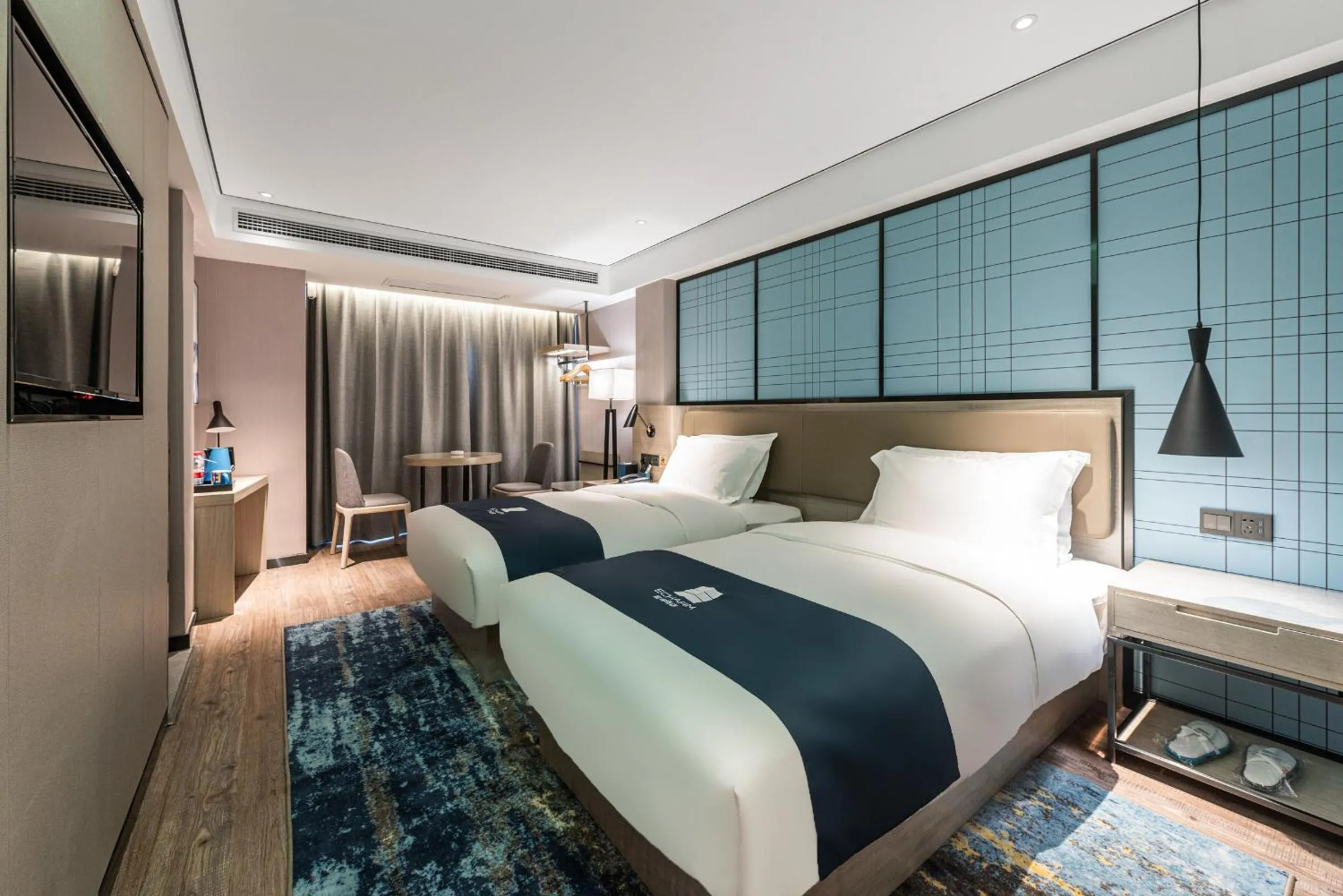 Bed in Echarm Hotel Yangshuo West Stree 宜尚酒店 阳朔西街店