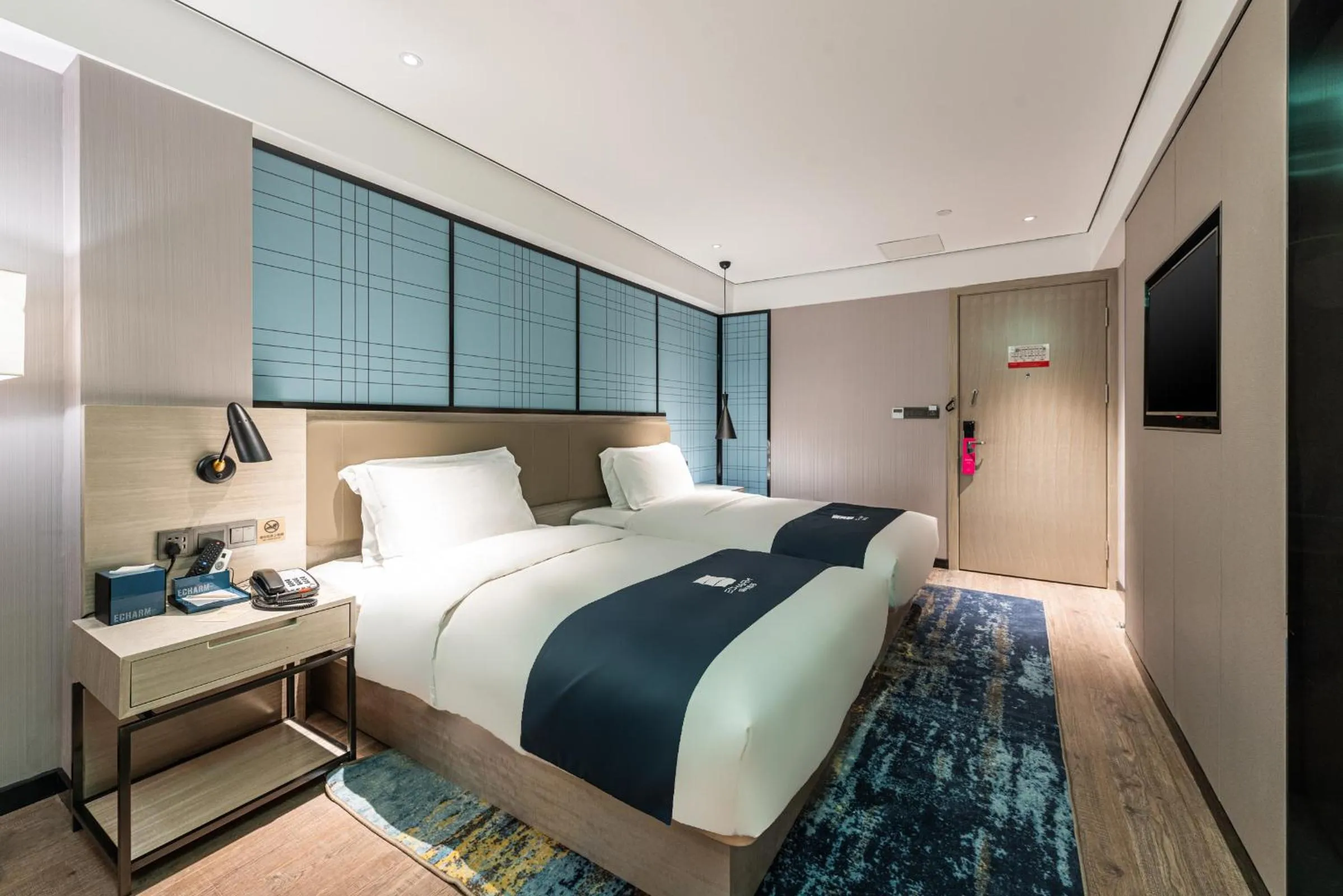 Bed in Echarm Hotel Yangshuo West Stree 宜尚酒店 阳朔西街店