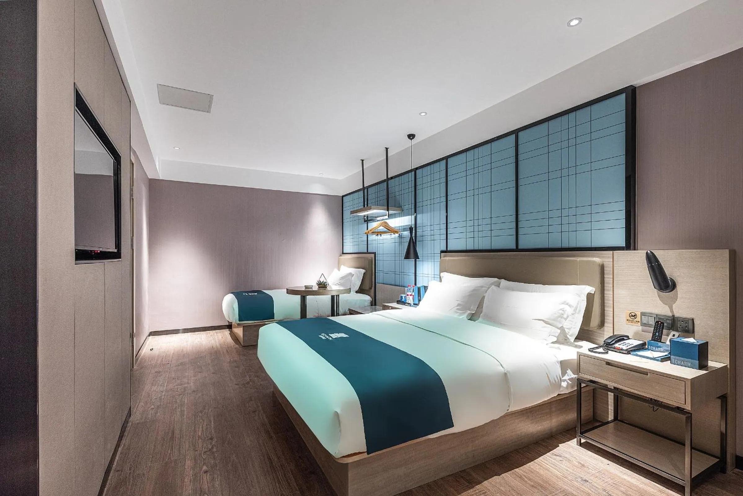 Bed in Echarm Hotel Yangshuo West Stree 宜尚酒店 阳朔西街店