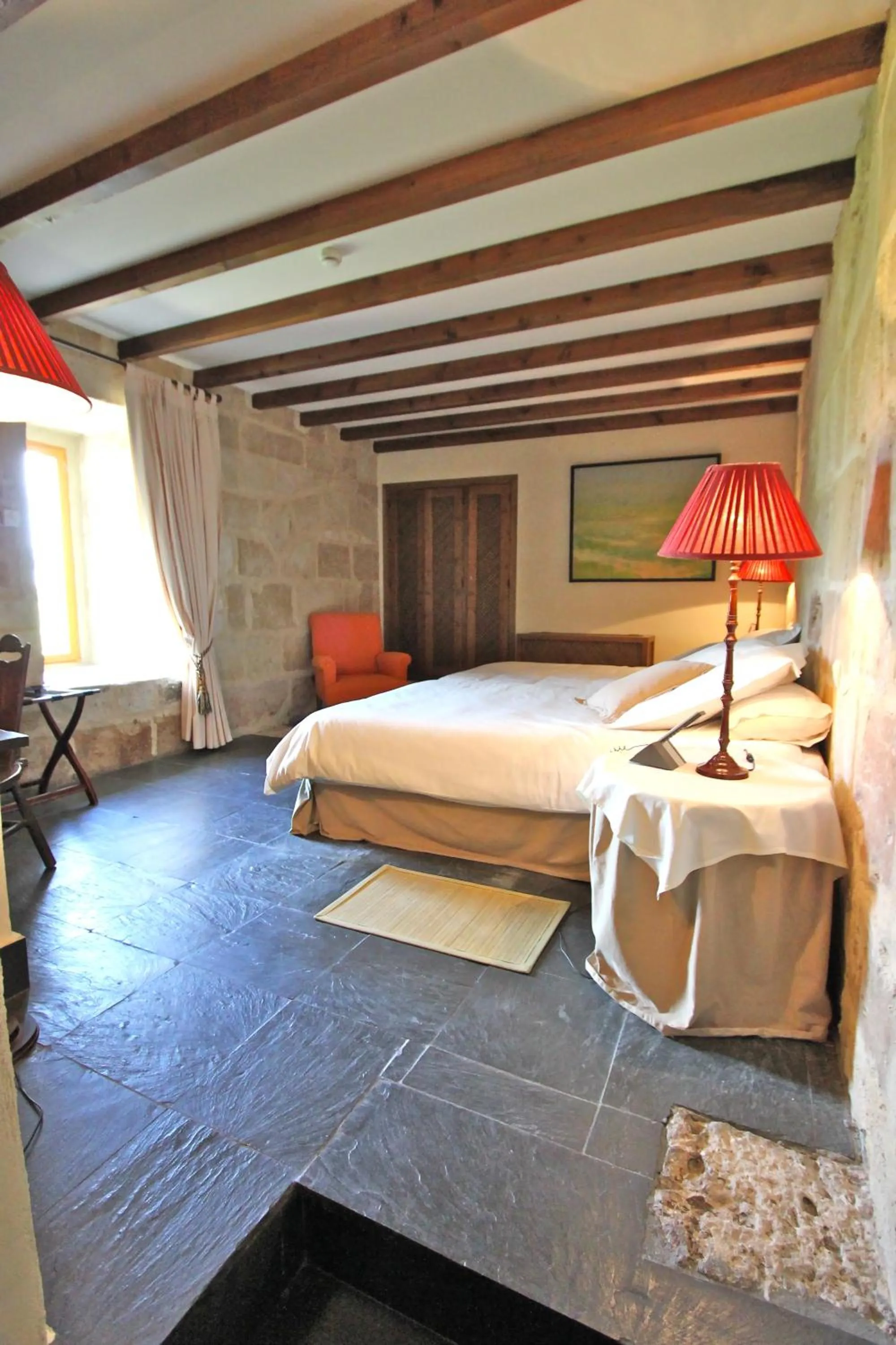 Bed in Posada Real Castillo del Buen Amor