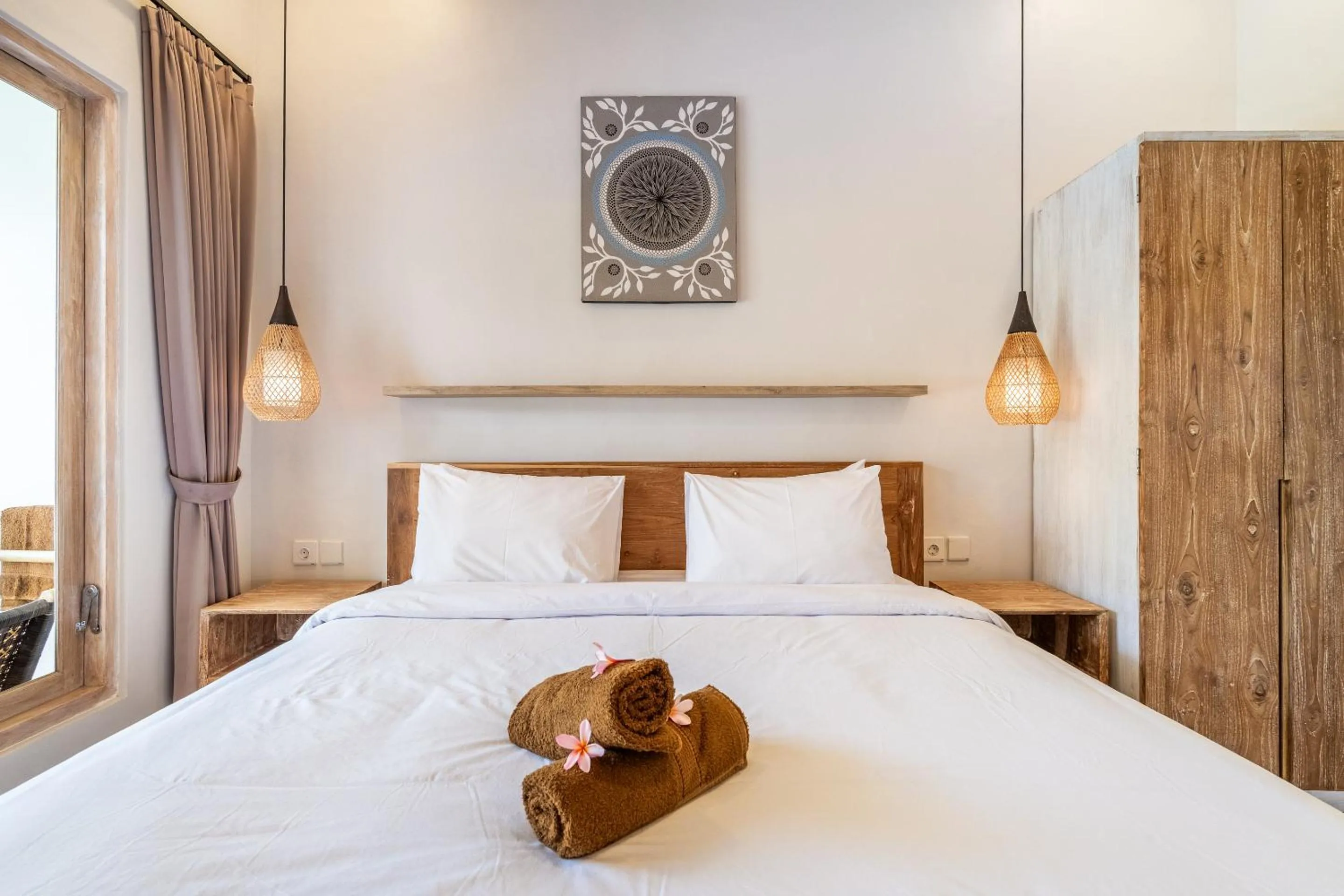 Bed in Aura Apartments Ubud