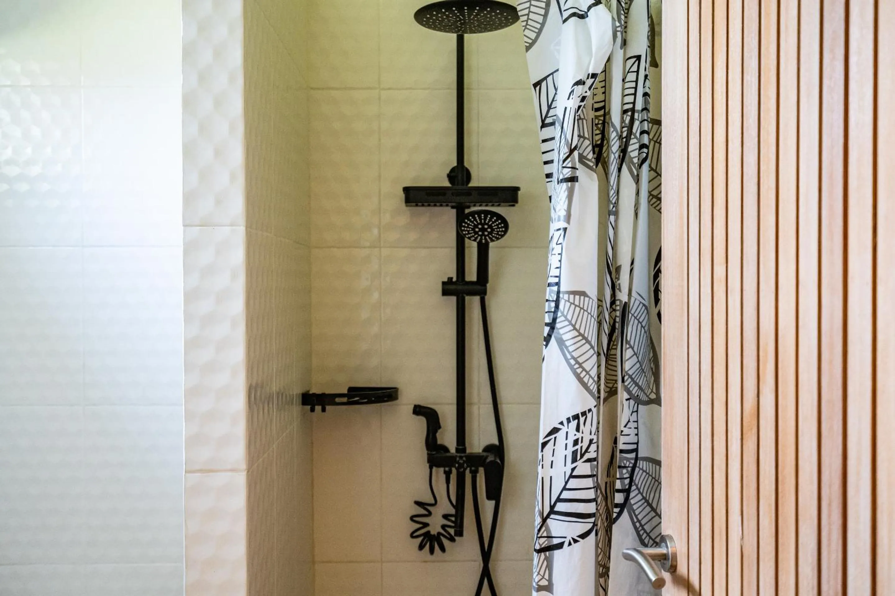 Shower in Aura Apartments Ubud