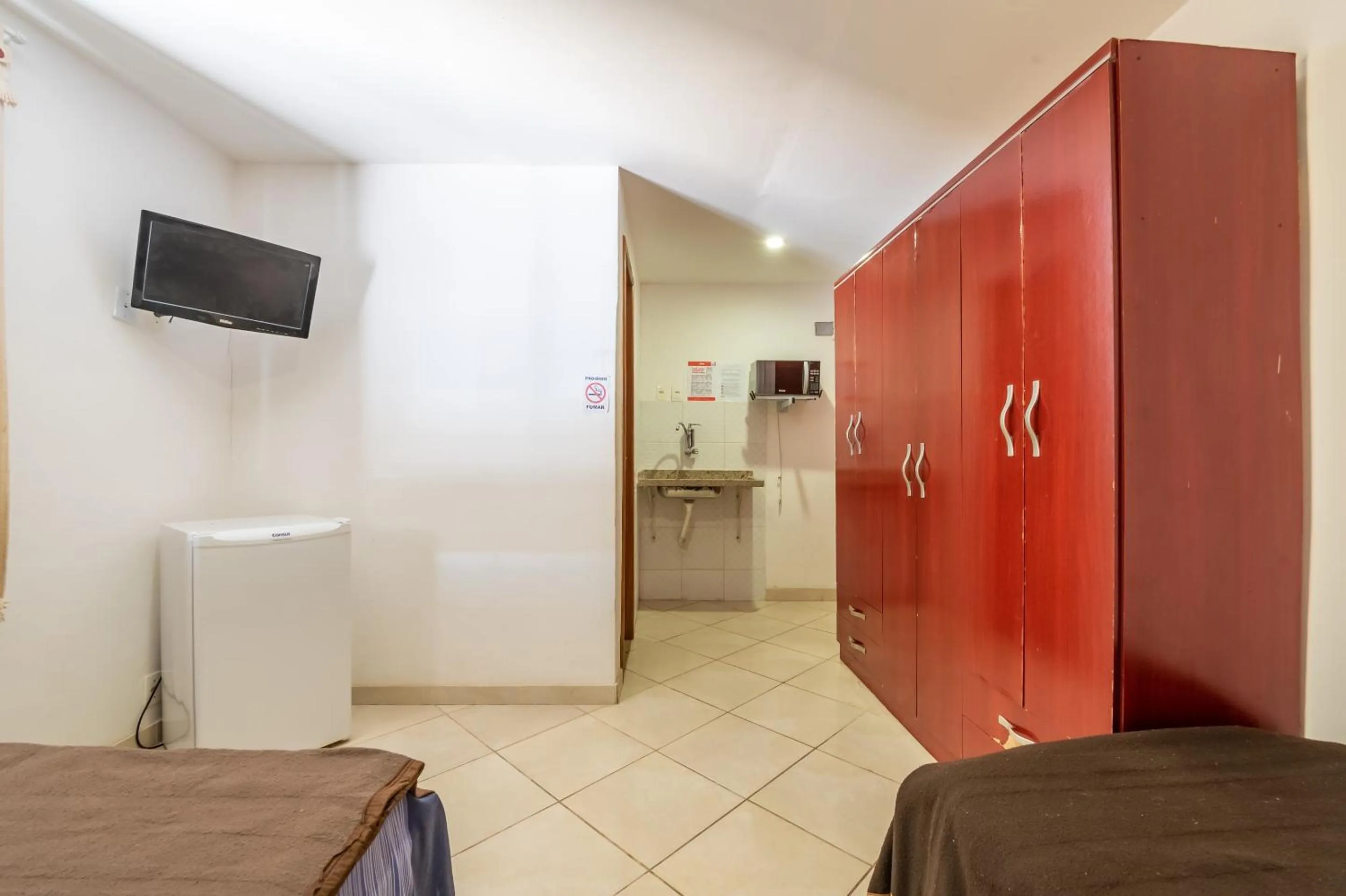 Bedroom, Bed in OYO Residencial Muriqui Apart Hotel, Mangaratiba