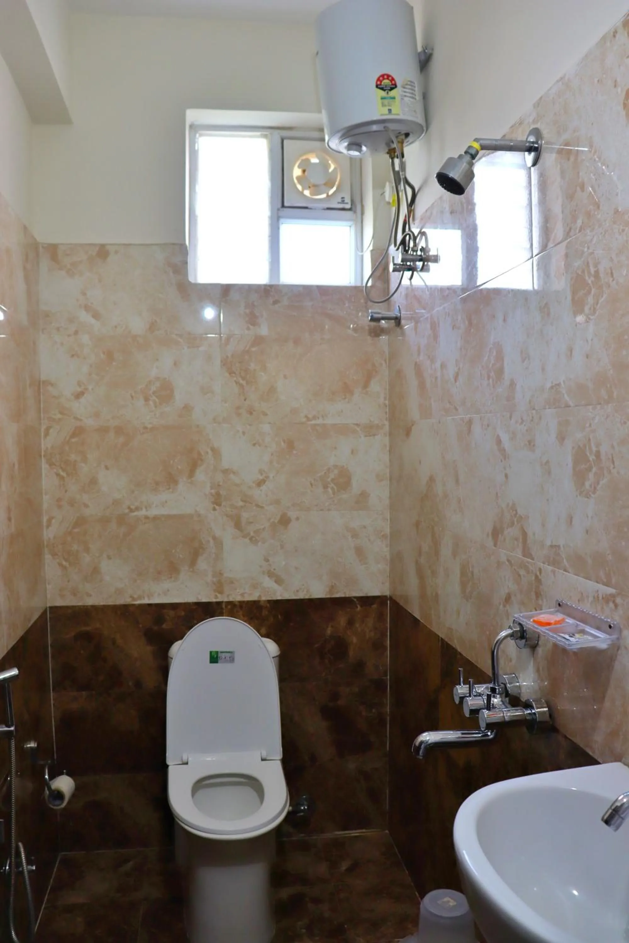 Shower in NirmalVilla Corporate Hotel