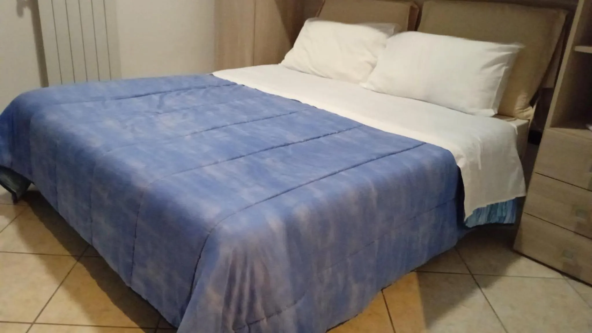 Bed in Pompei Duplex Apartment Deluxe