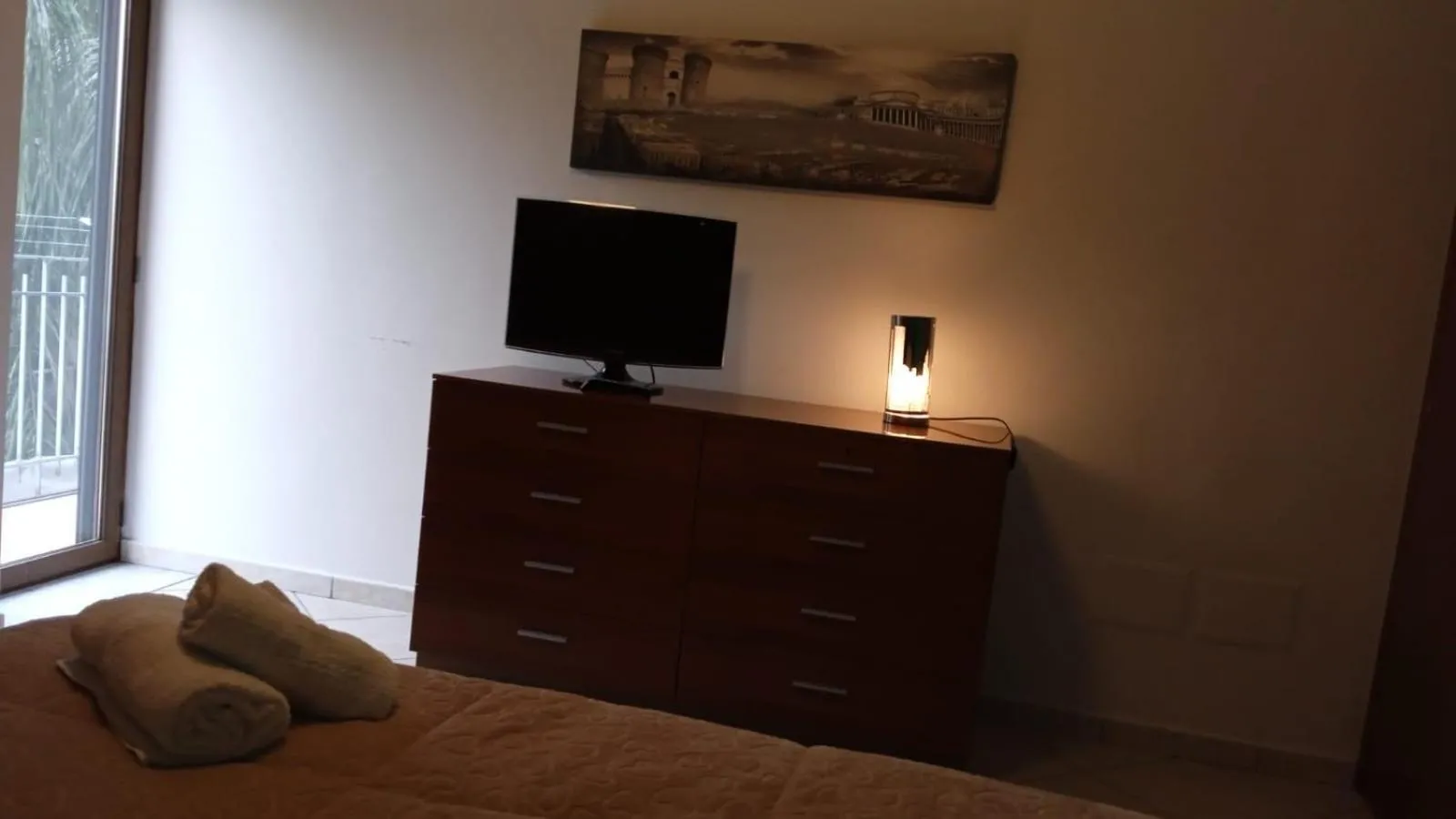 Bed in Pompei Duplex Apartment Deluxe
