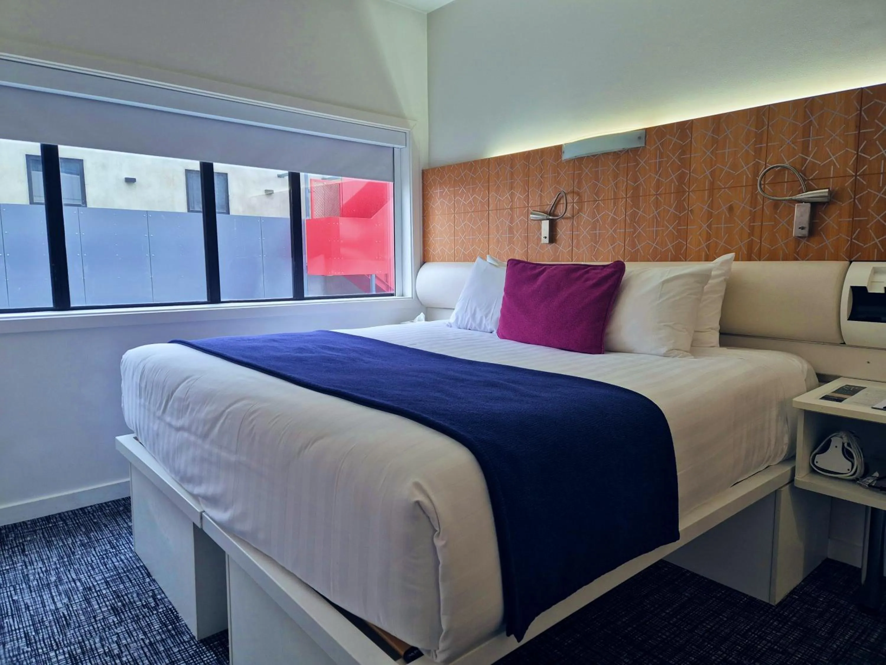 Bed in BreakFree on Cashel, an Accor Hotel