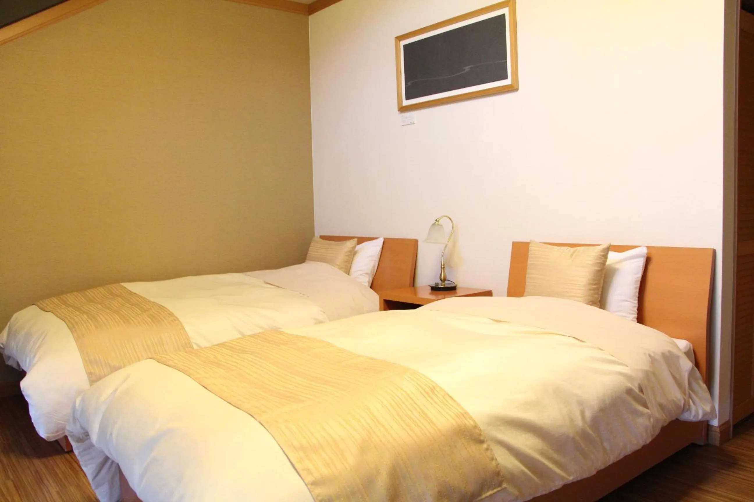 Bed in Maruyama Onsen Kojyokan