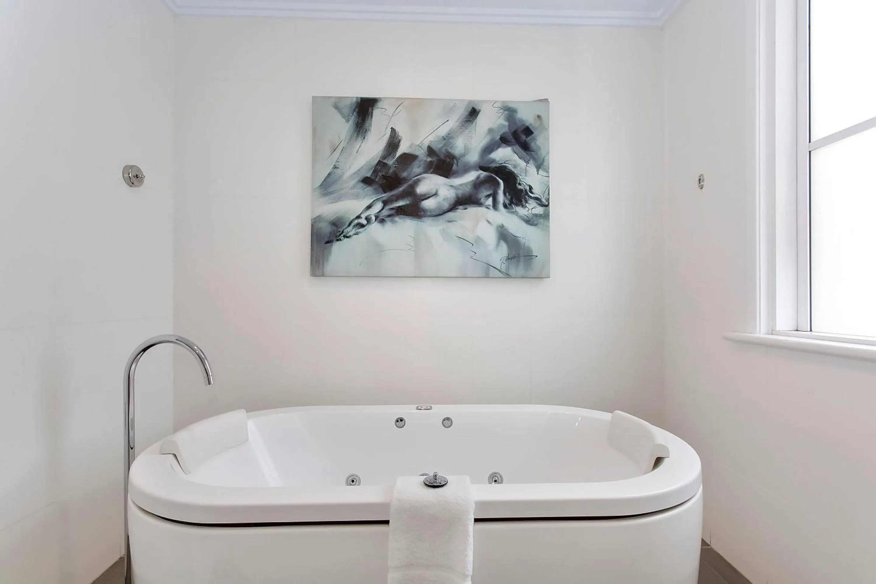 Bedroom in CH Boutique Hotel & Apartments, an Ascend Collection Hotel