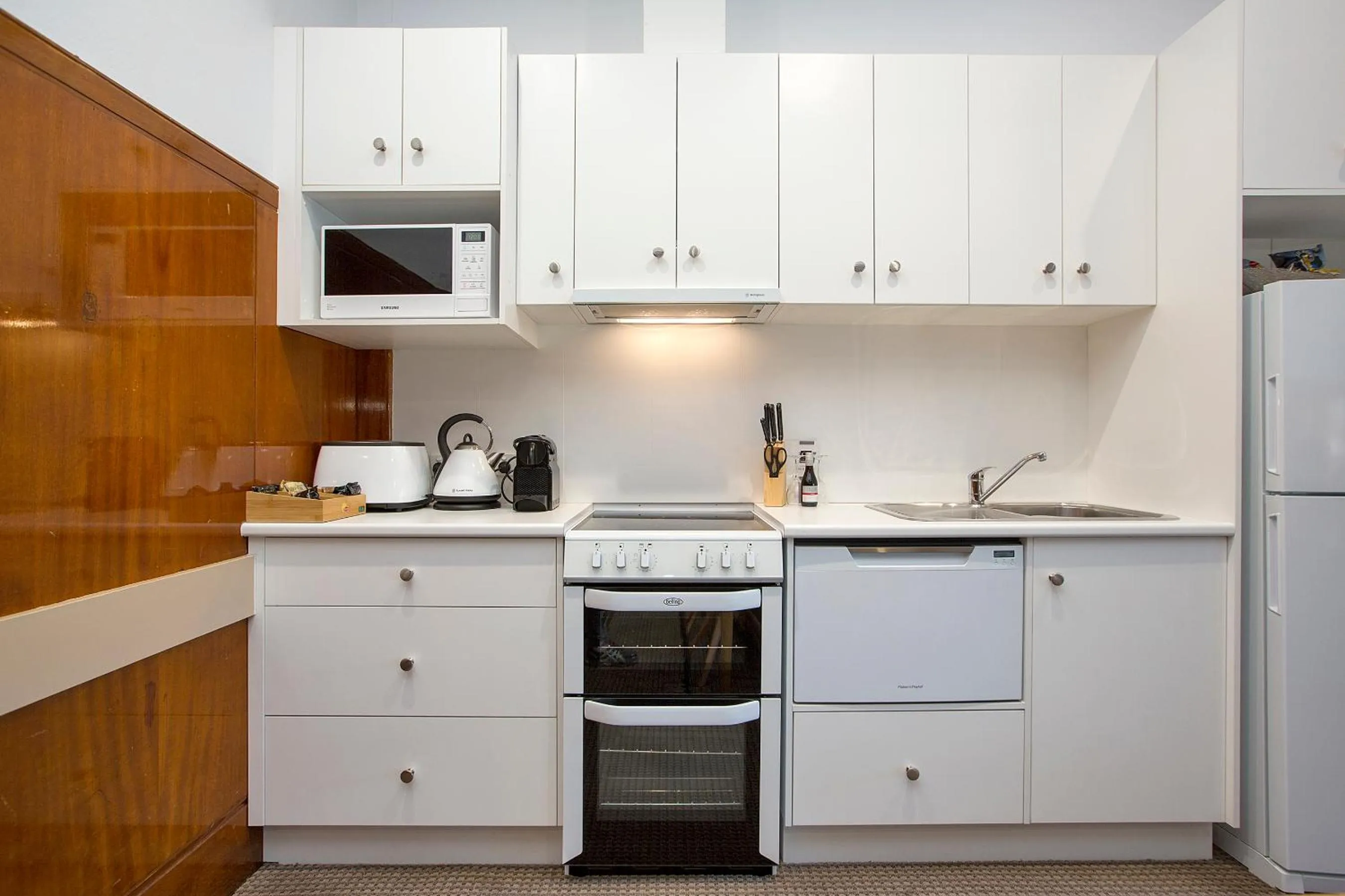 Kitchen or kitchenette in CH Boutique Hotel & Apartments, an Ascend Collection Hotel