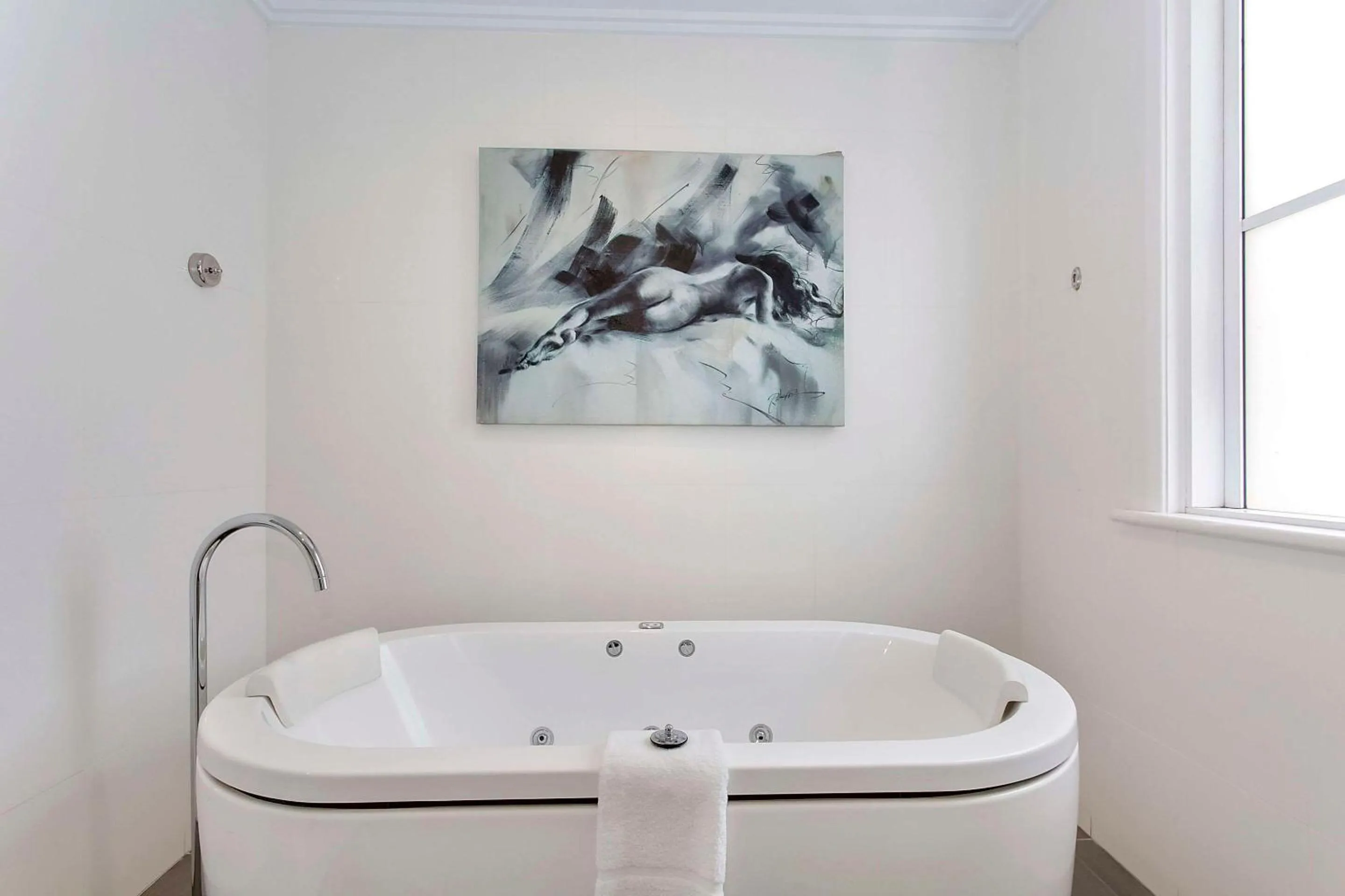 Bedroom in CH Boutique Hotel & Apartments, an Ascend Collection Hotel