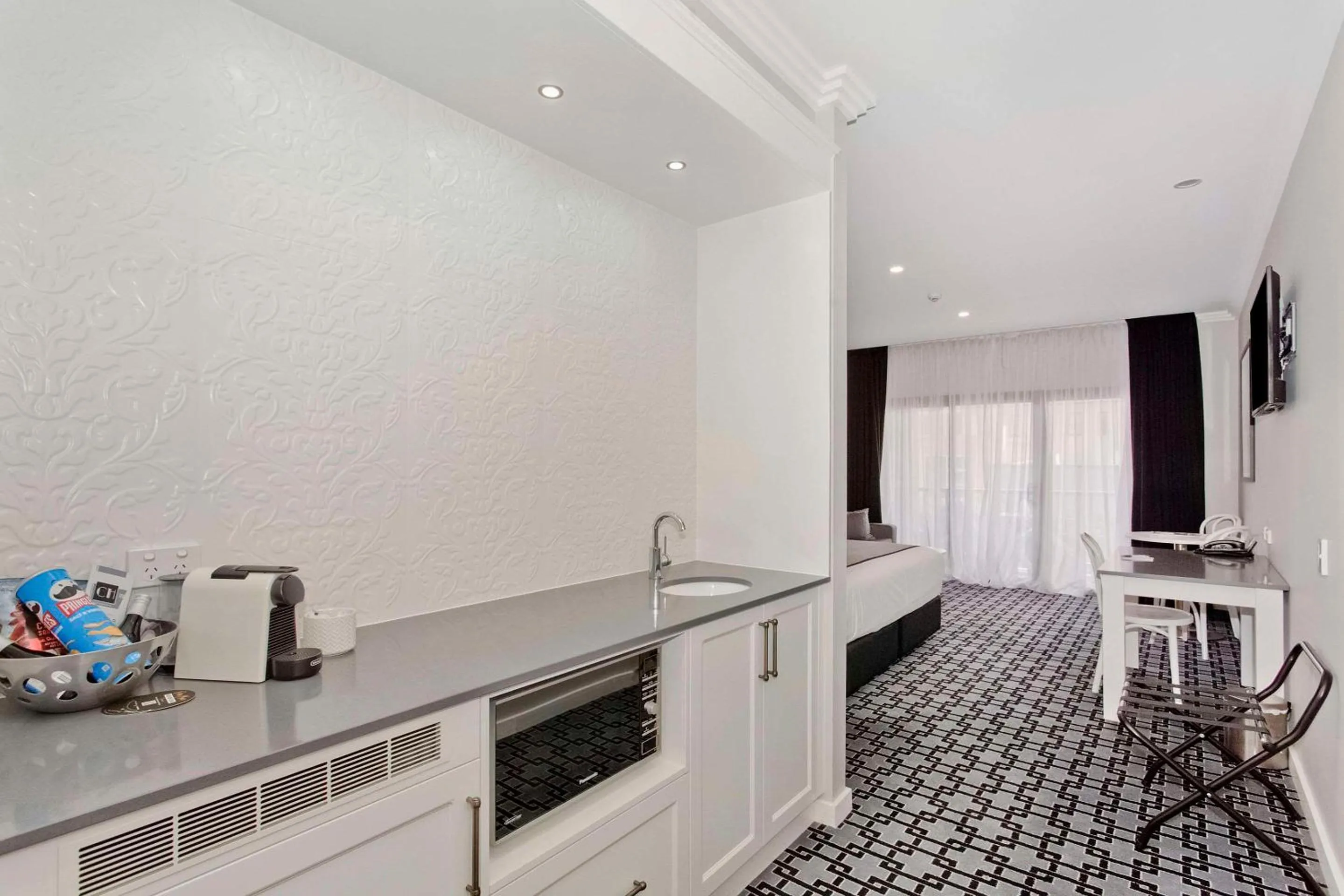 Bedroom in CH Boutique Hotel & Apartments, an Ascend Collection Hotel