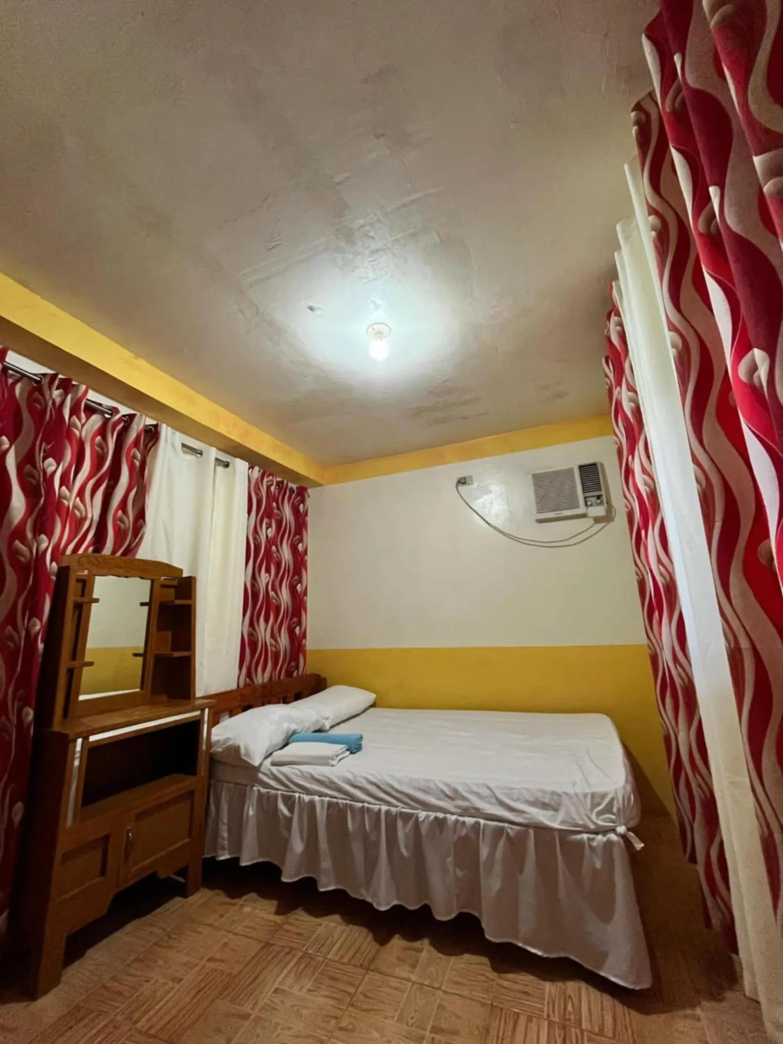 Bed in Isla Paraiso Resort-Hotel