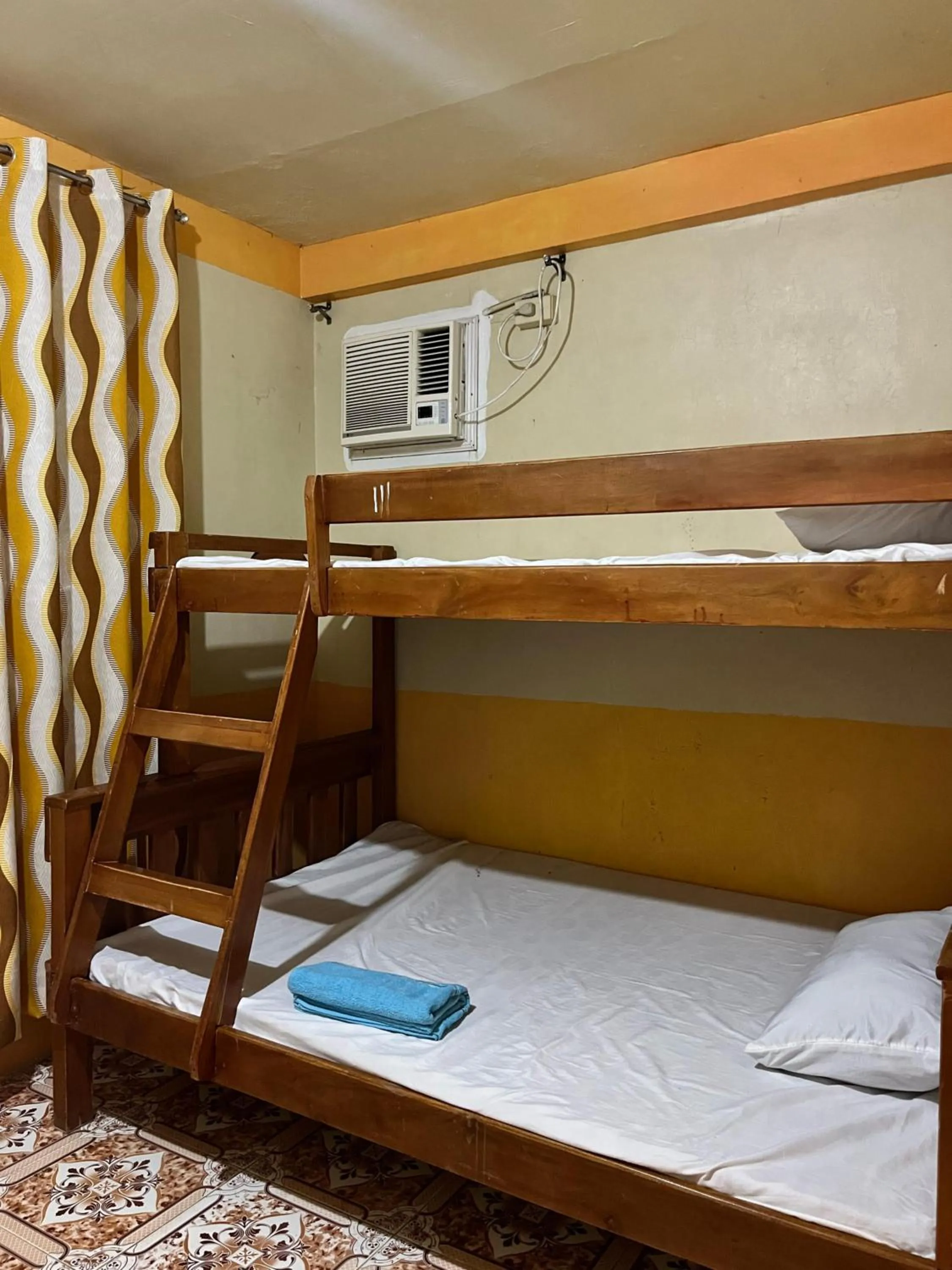 Bed in Isla Paraiso Resort-Hotel