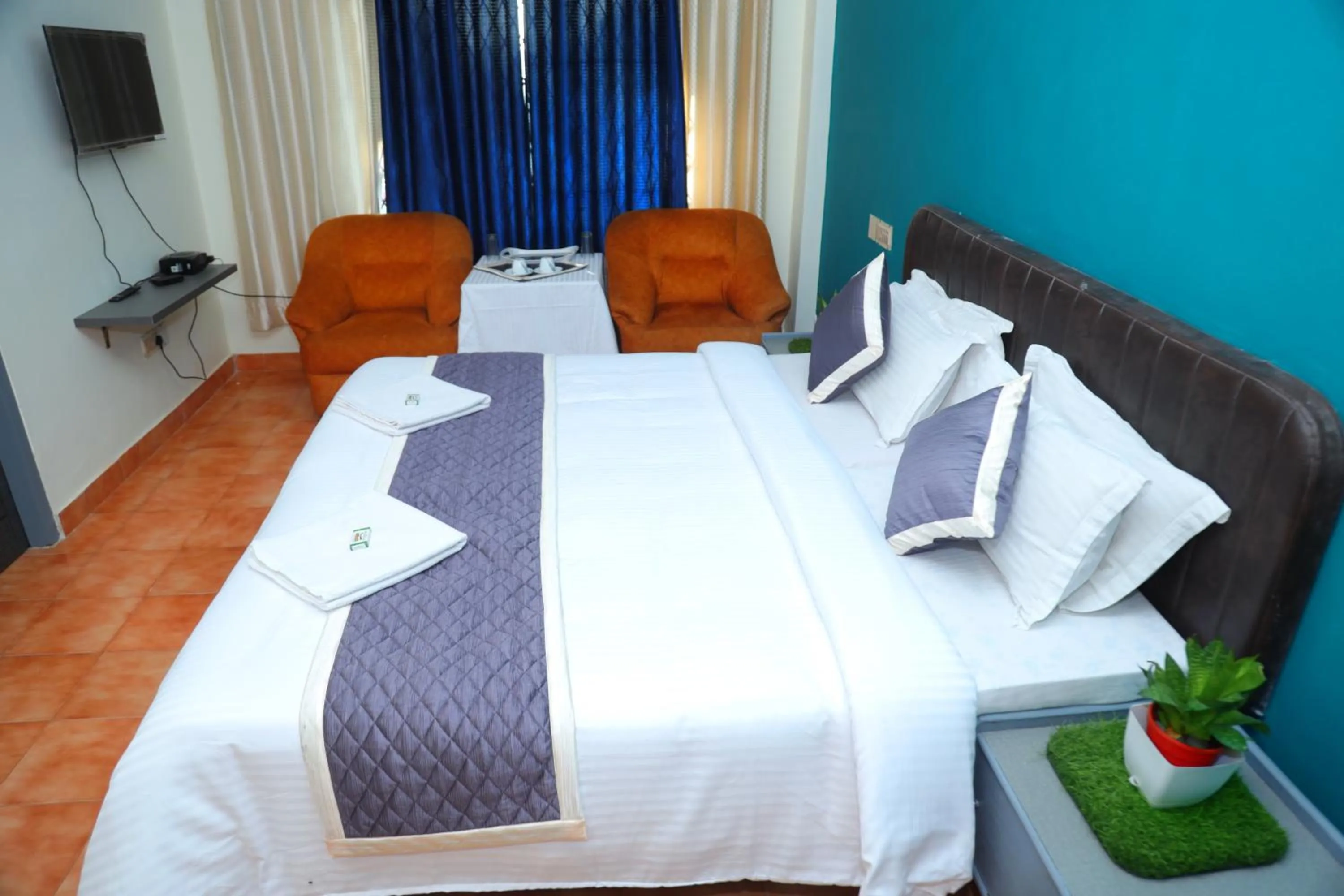 Bed in Grand Harmony Beach Resort