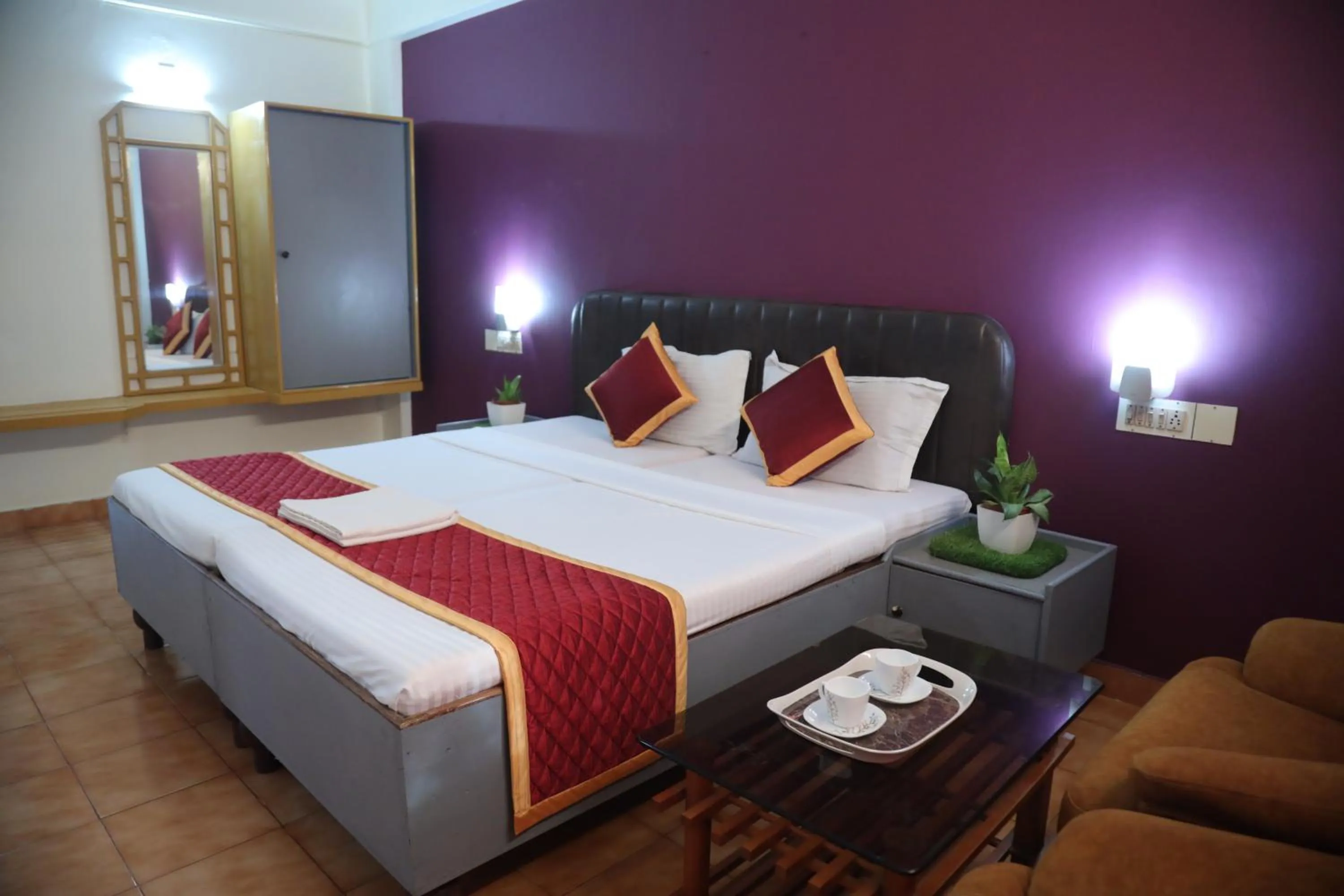 Bed in Grand Harmony Beach Resort