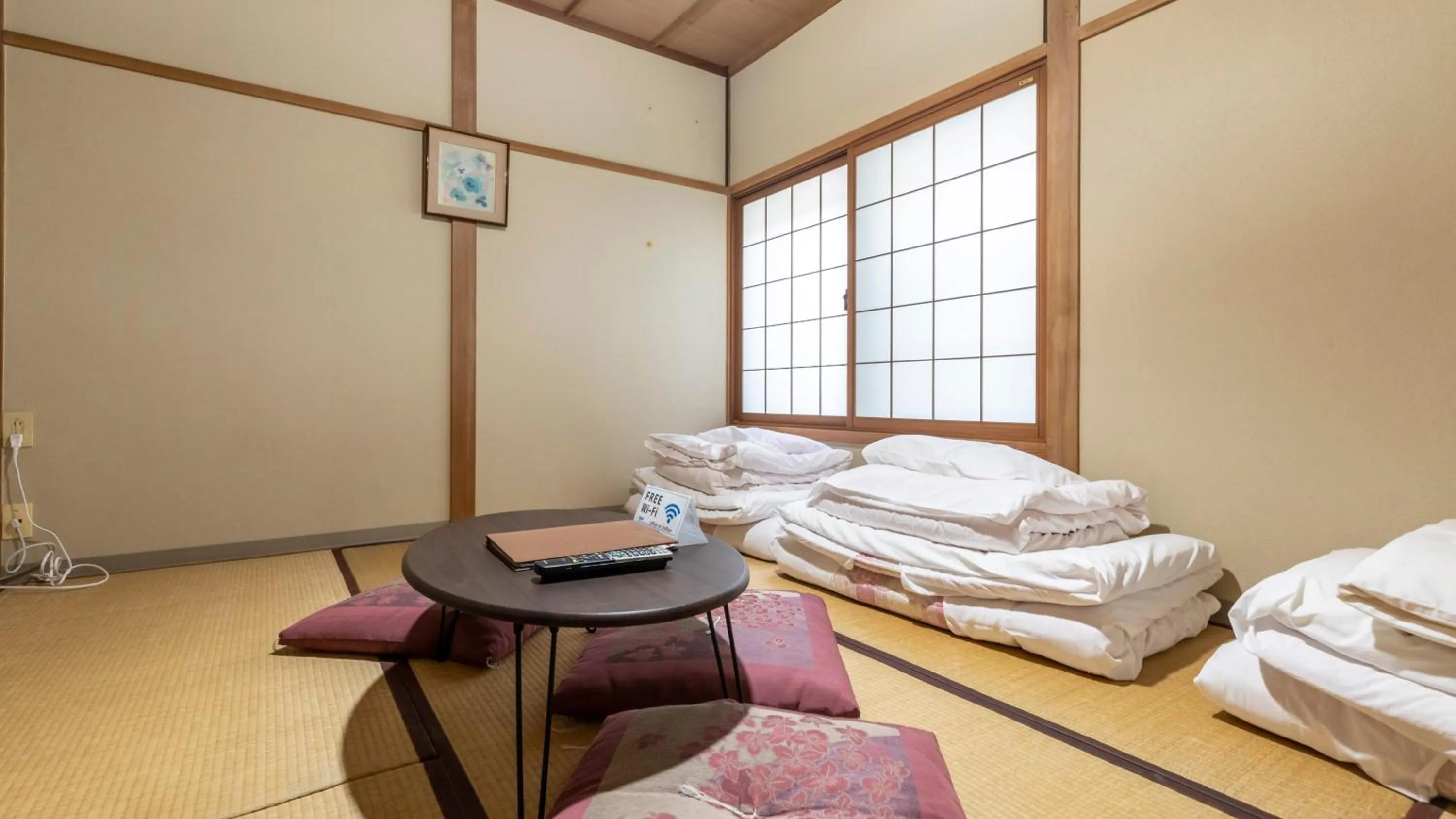 Bed in Tabist International Hotel Kaike