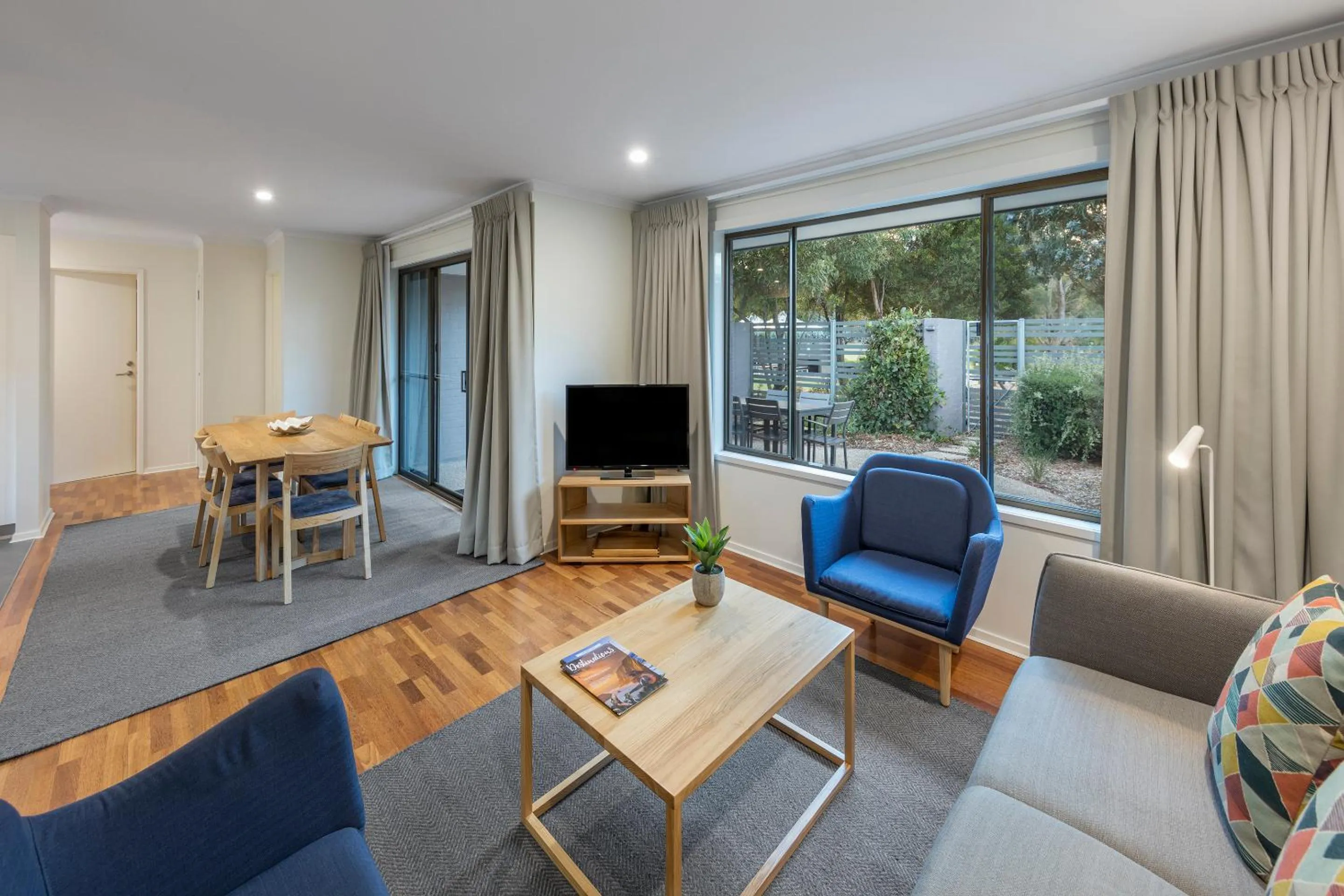 Living room in Club Wyndham Seven Mile Beach, Trademark Collection by Wyndham