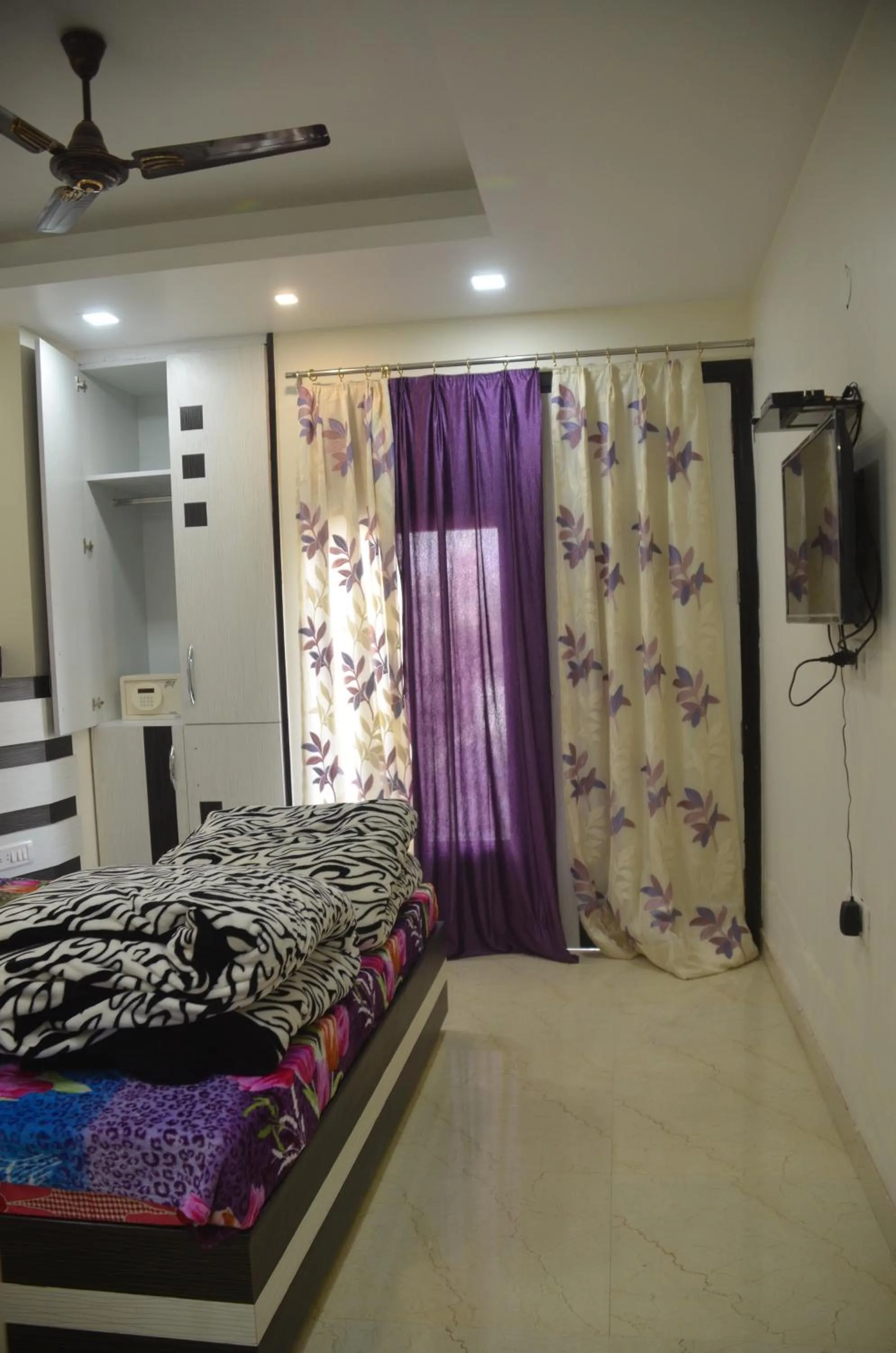Bedroom in Goel Residency