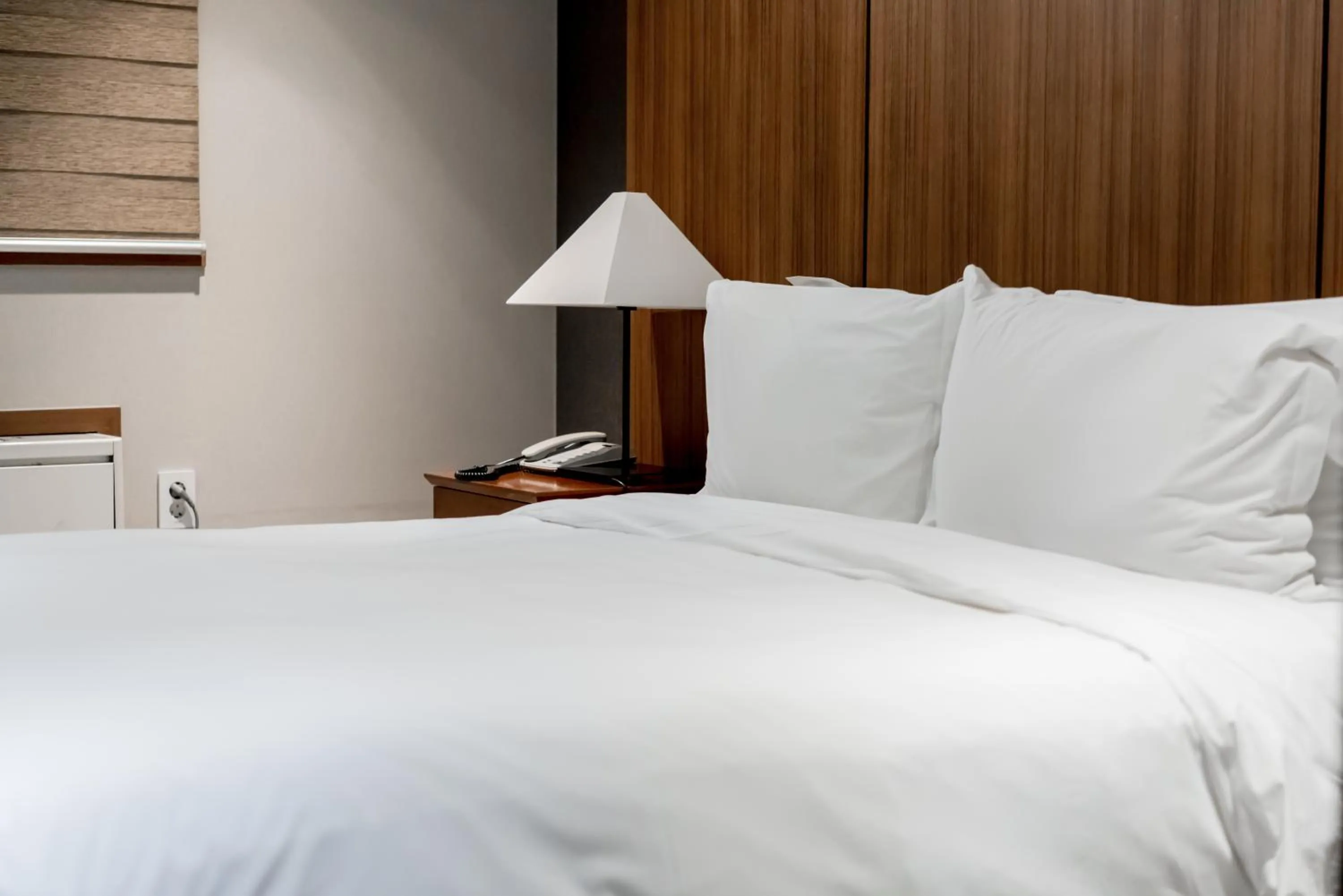 Bed in Oriens Hotel & Residences Myeongdong