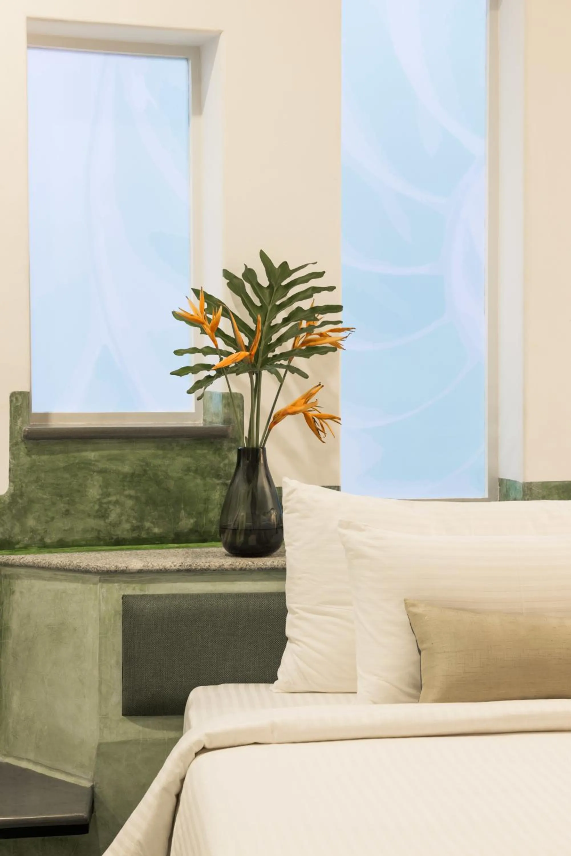 Bed in Xandari Pearl Beach Resort