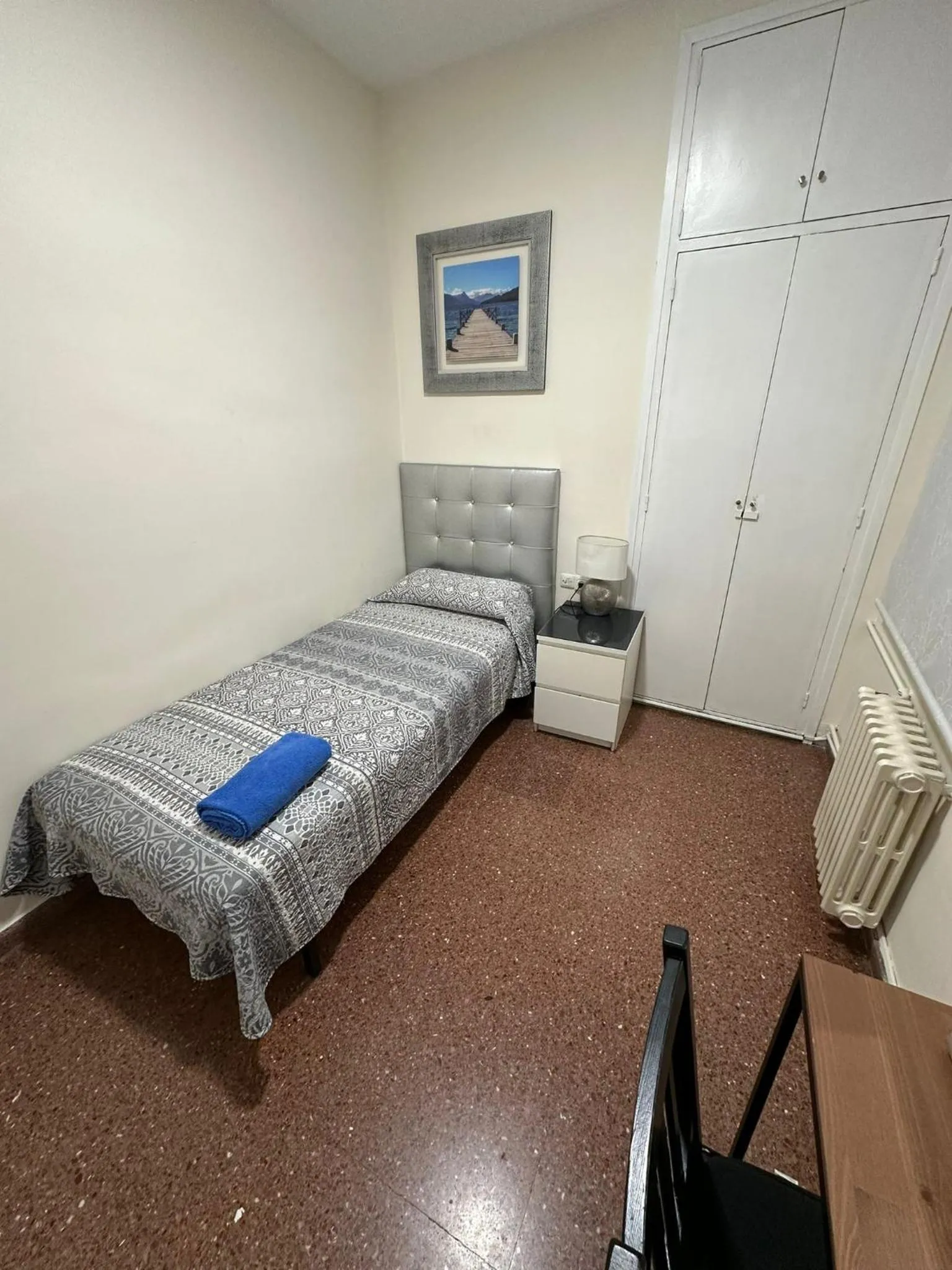 Bed in Viladomat Rooms