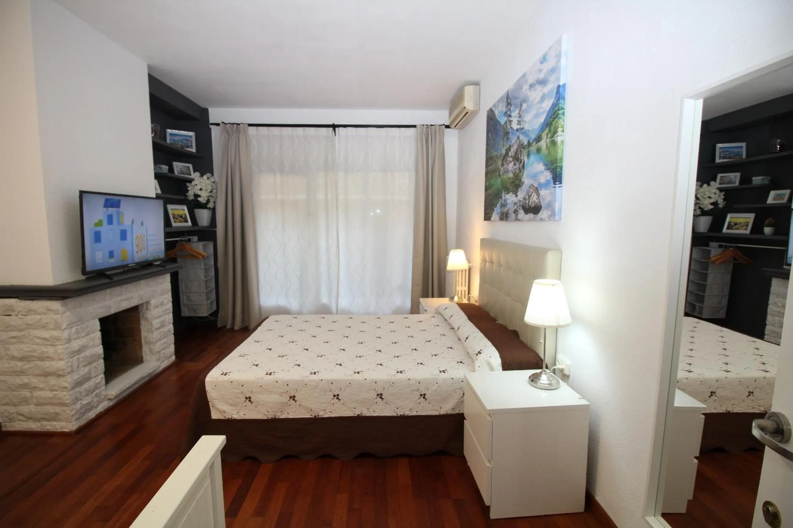 Bed in Viladomat Rooms