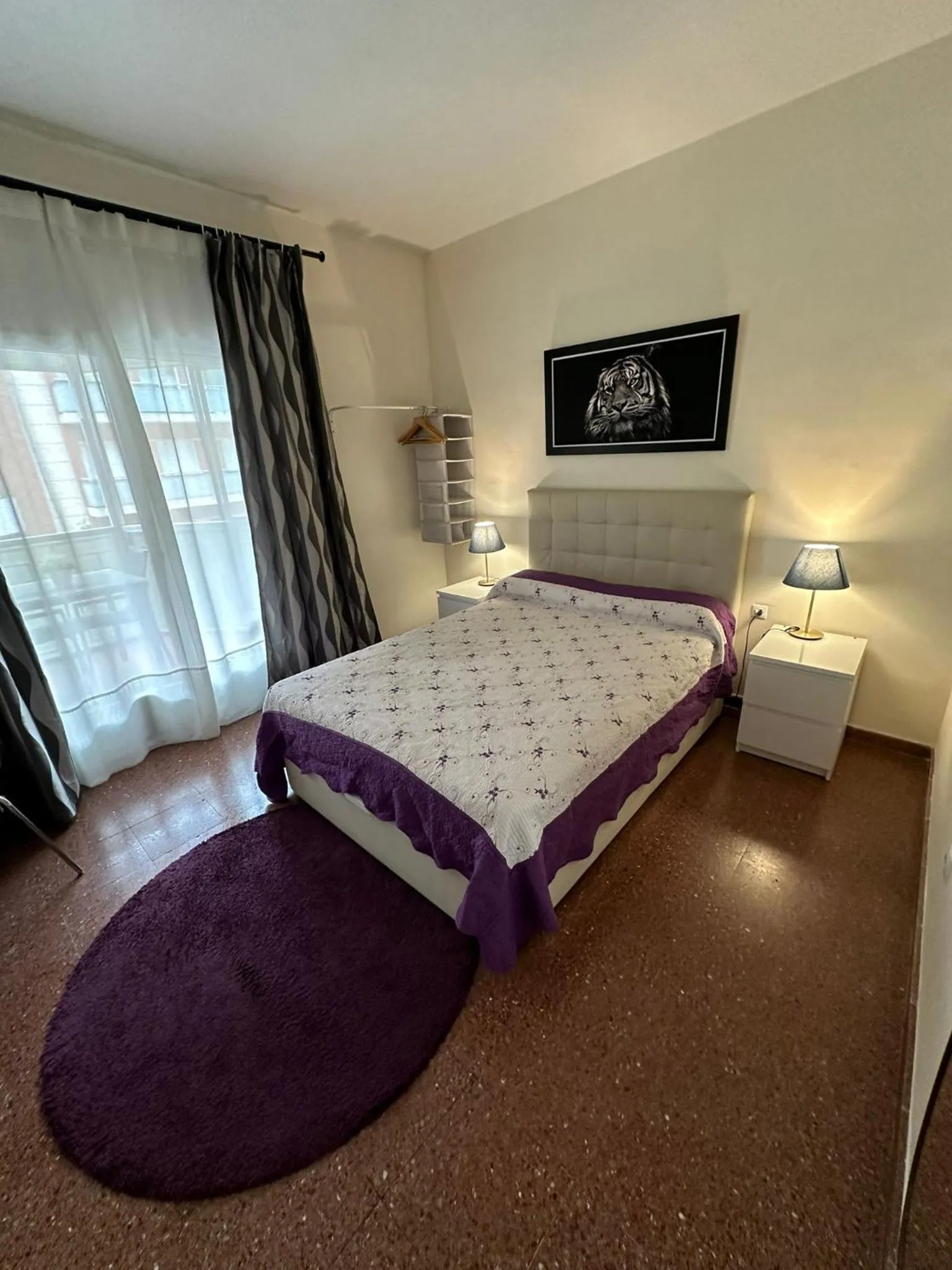 Bed in Viladomat Rooms