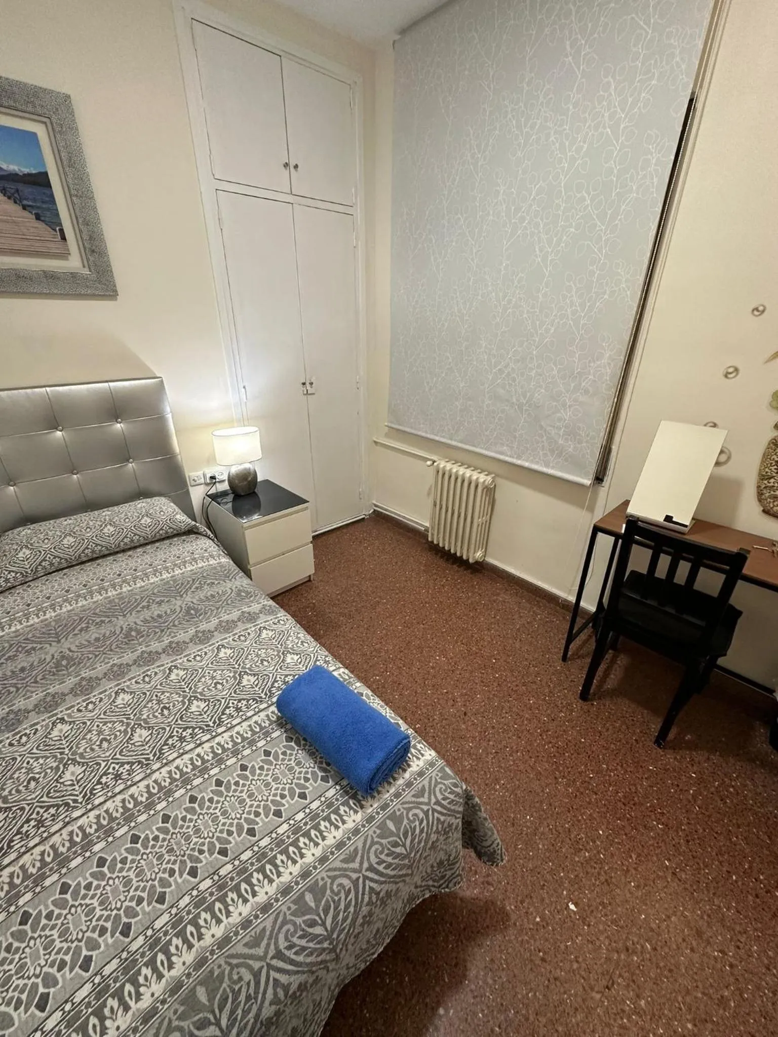 Bed in Viladomat Rooms