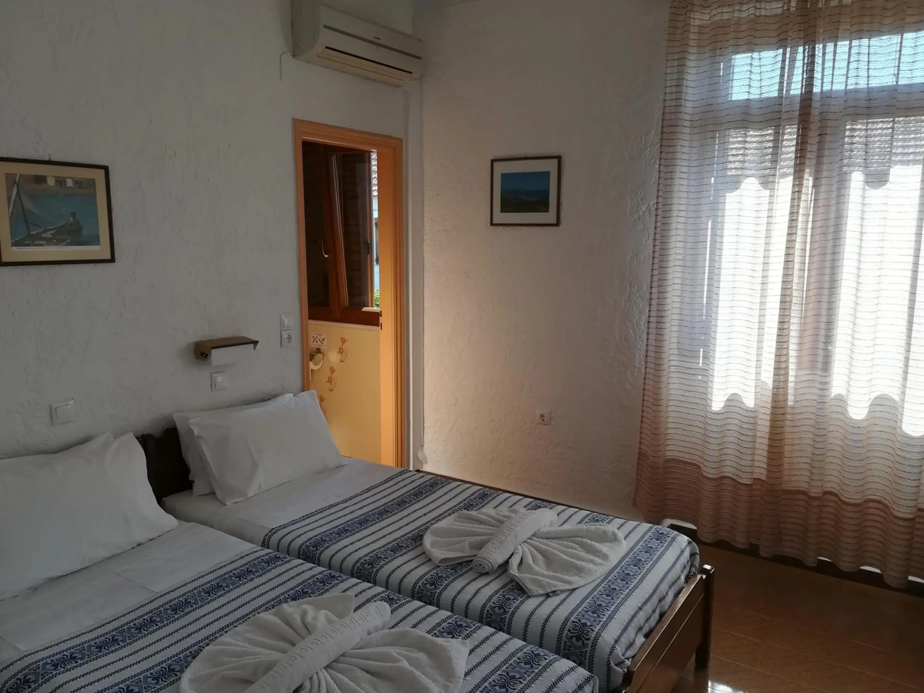 Superior Triple Room with Sea View in Pythaïs Hotel Superior Triple Room with Sea View in Pythaïs Hotel