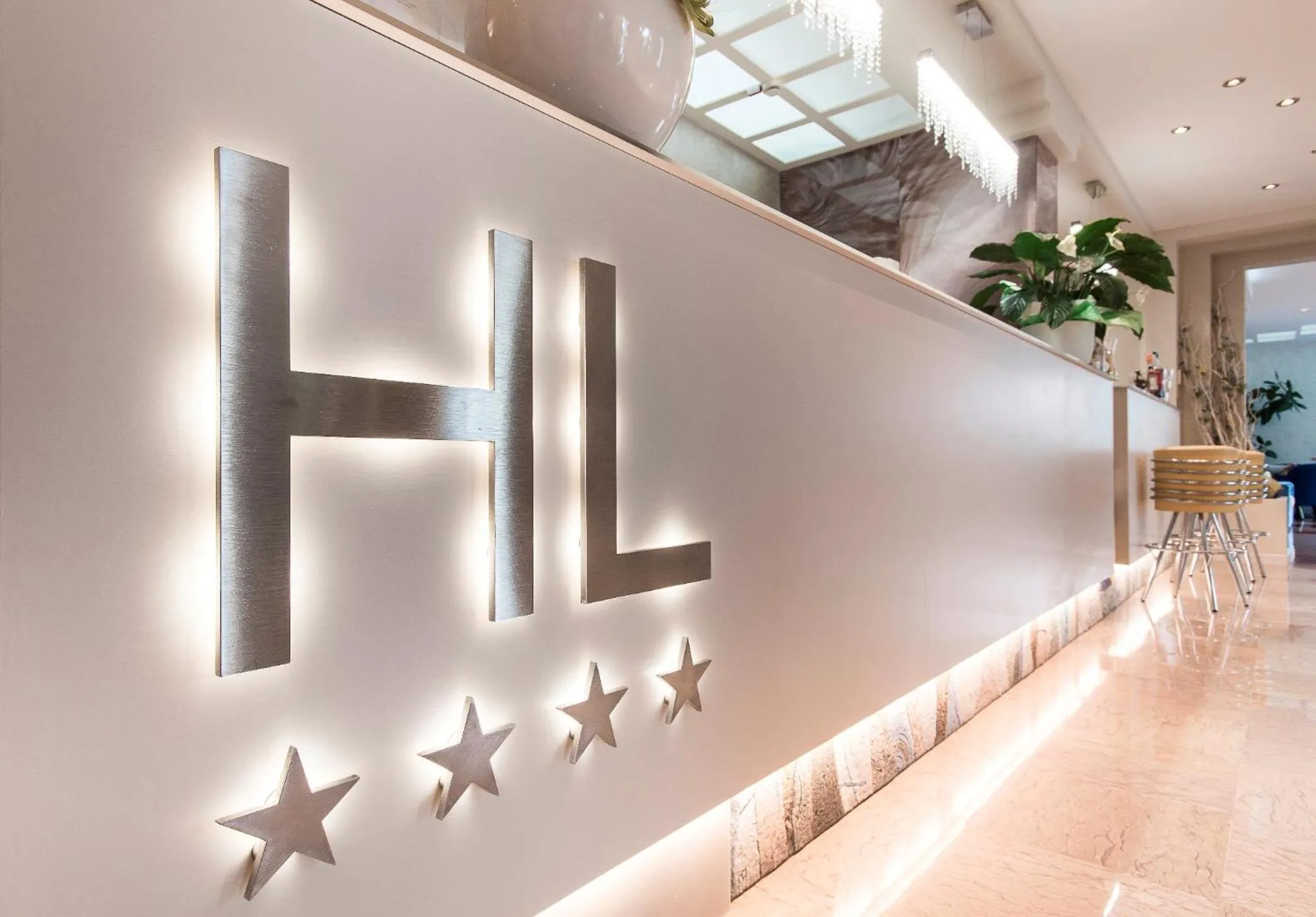 Property logo or sign in Hotel Losanna