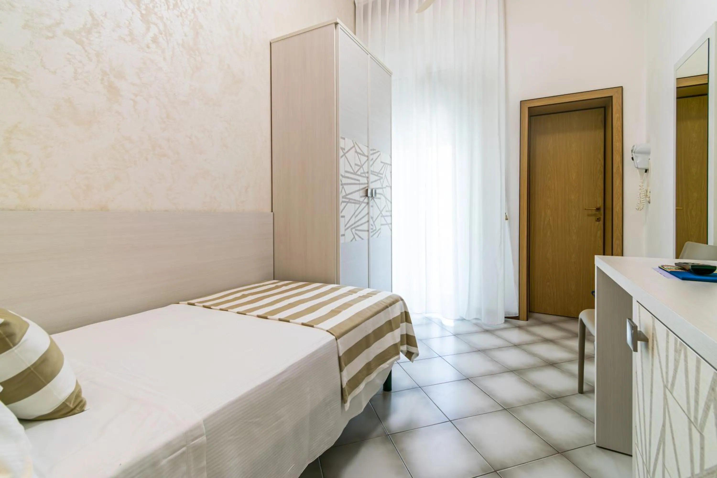 Bed in Hotel Losanna