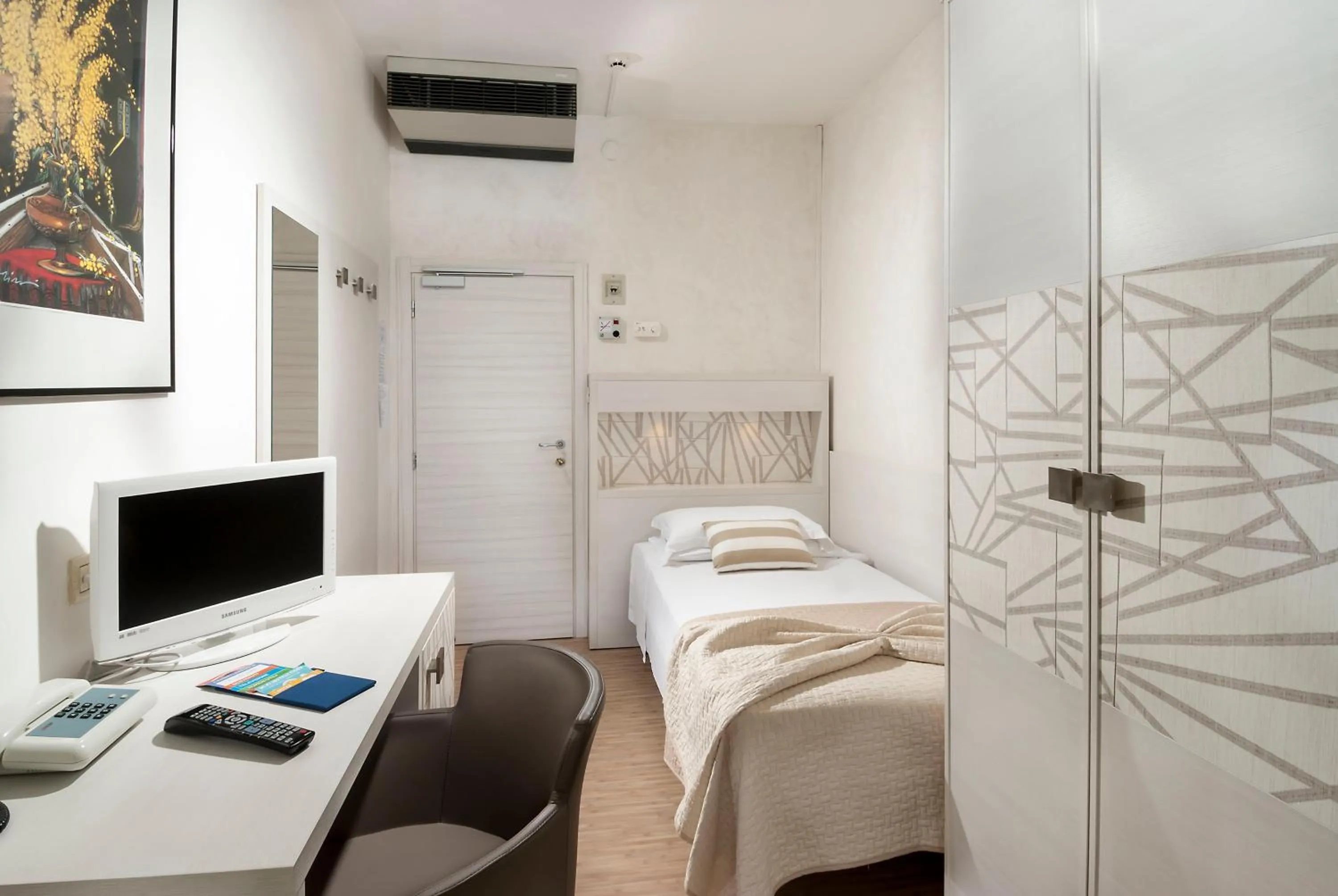 Bed in Hotel Losanna