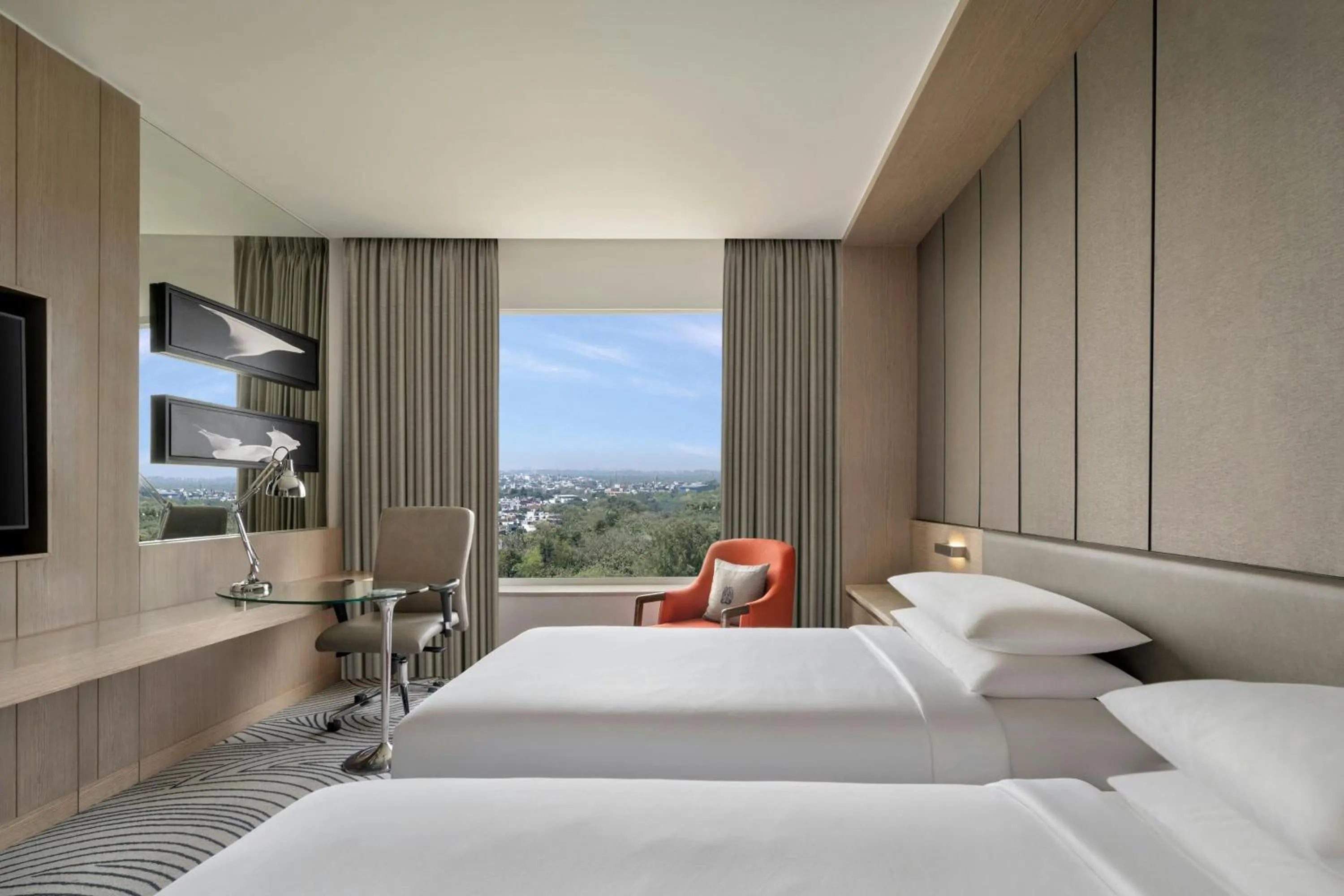 Photo of the whole room, Bed in Sheraton New Delhi Hotel