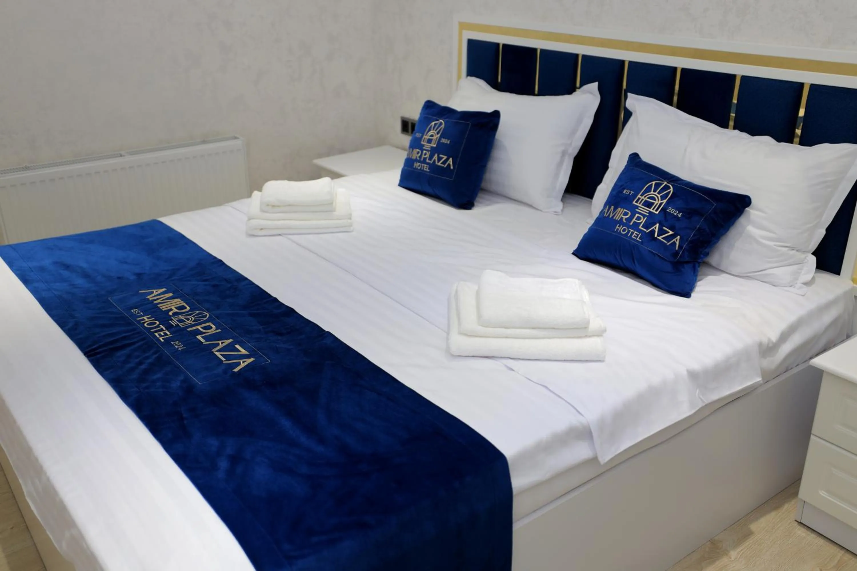 Bed in AMIR PLAZA hotel