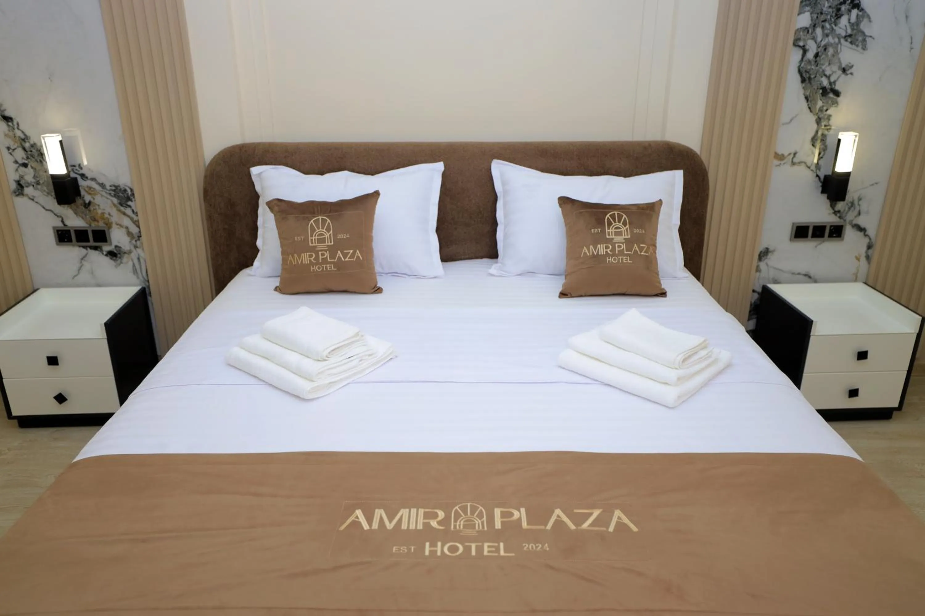 Bed in AMIR PLAZA hotel