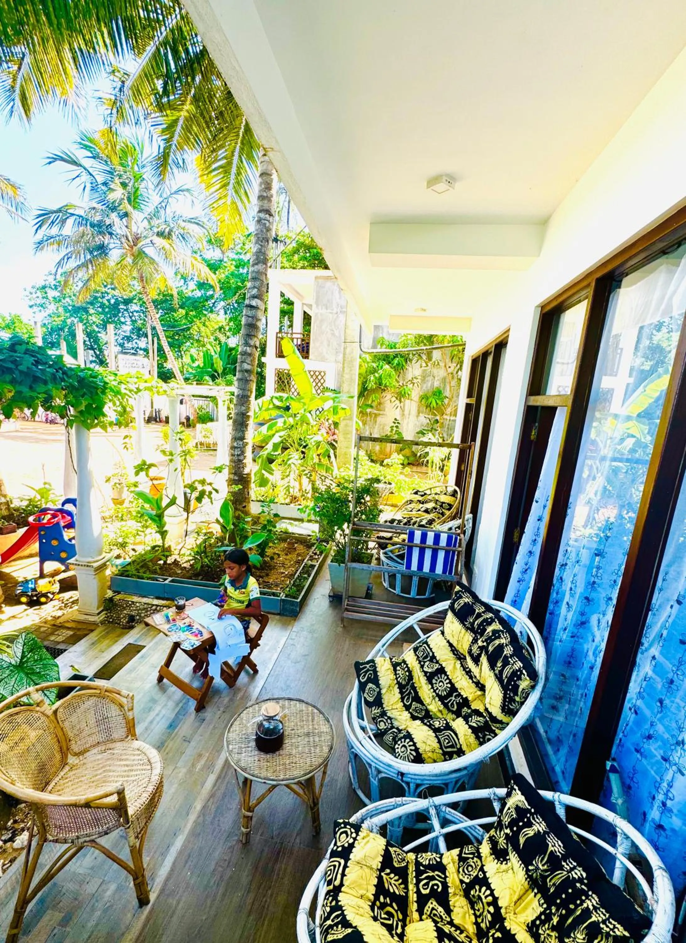 Day in Coconut Palm beach restaurant and rooms