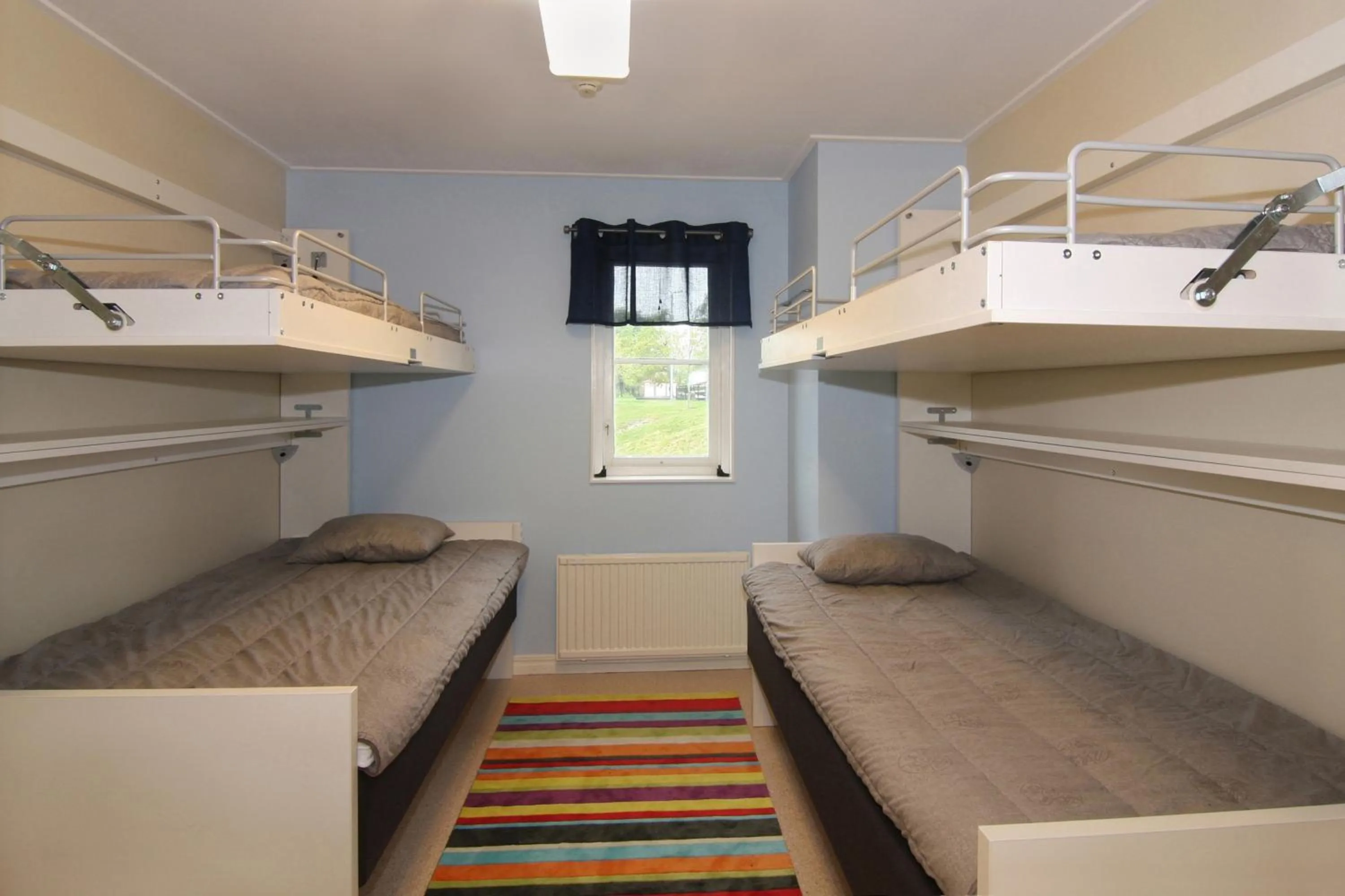 Bed in Bergs Slussar Vandrarhem & Stugor