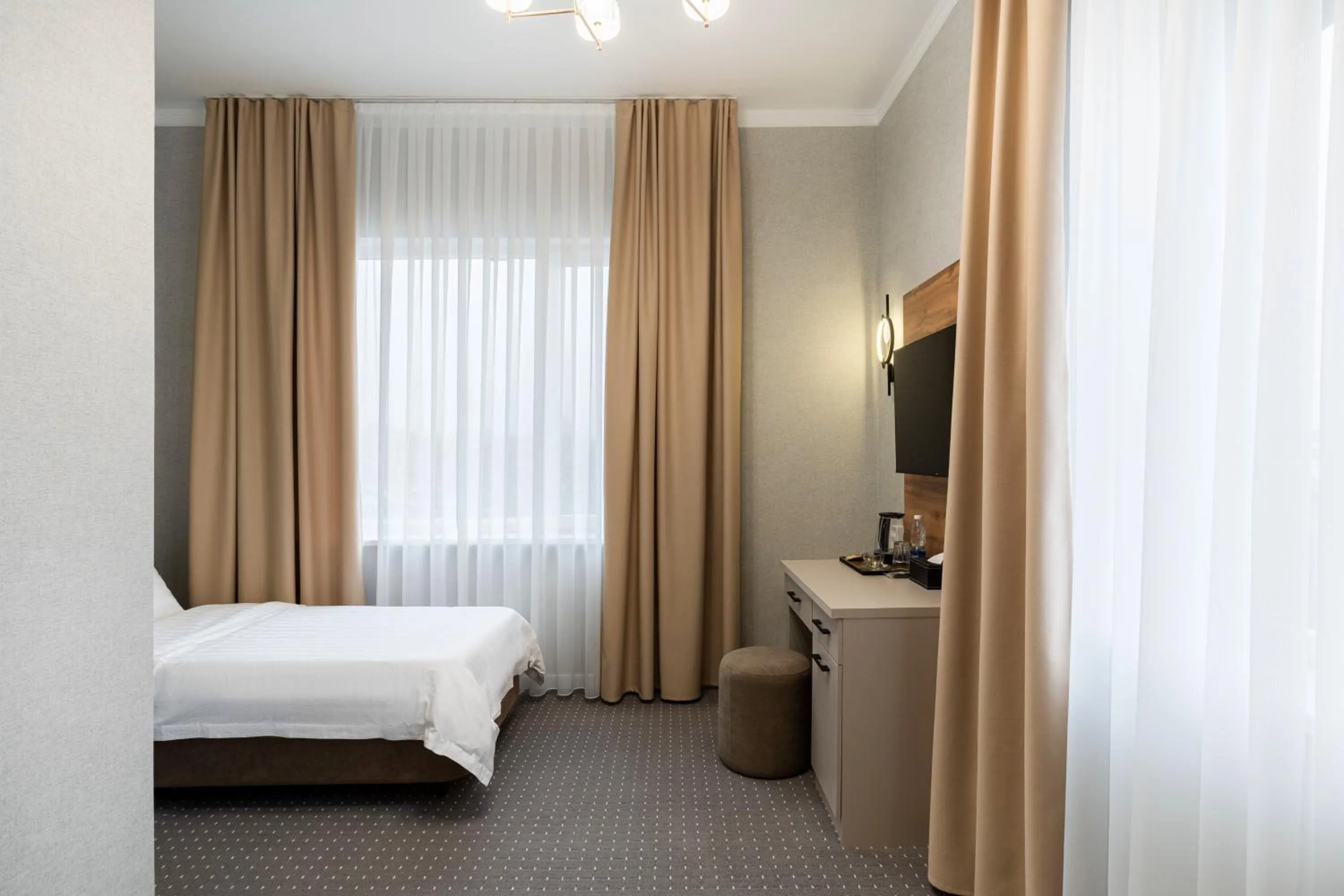 Photo of the whole room, Bed in Cozy Hotel