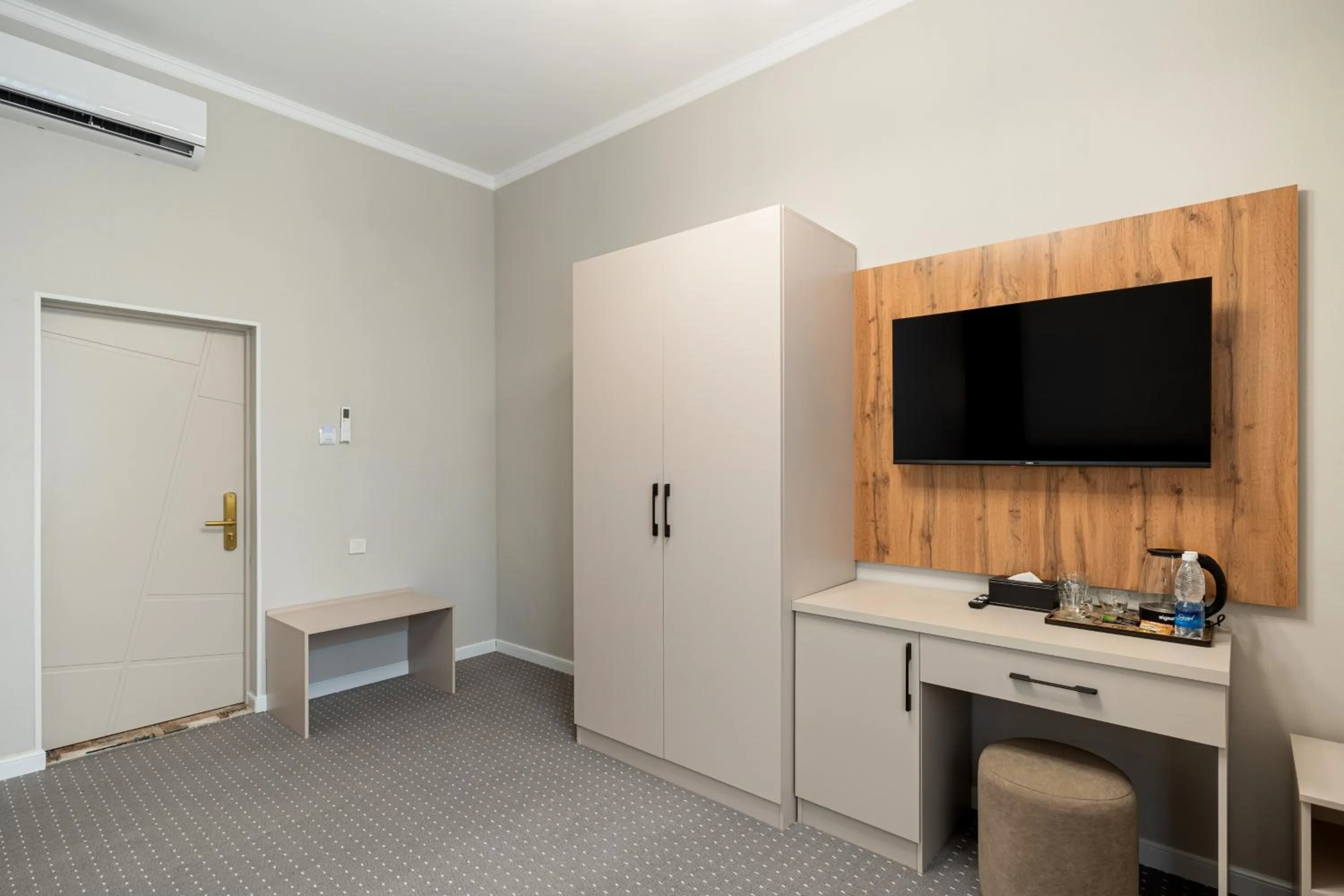 Photo of the whole room in Cozy Hotel