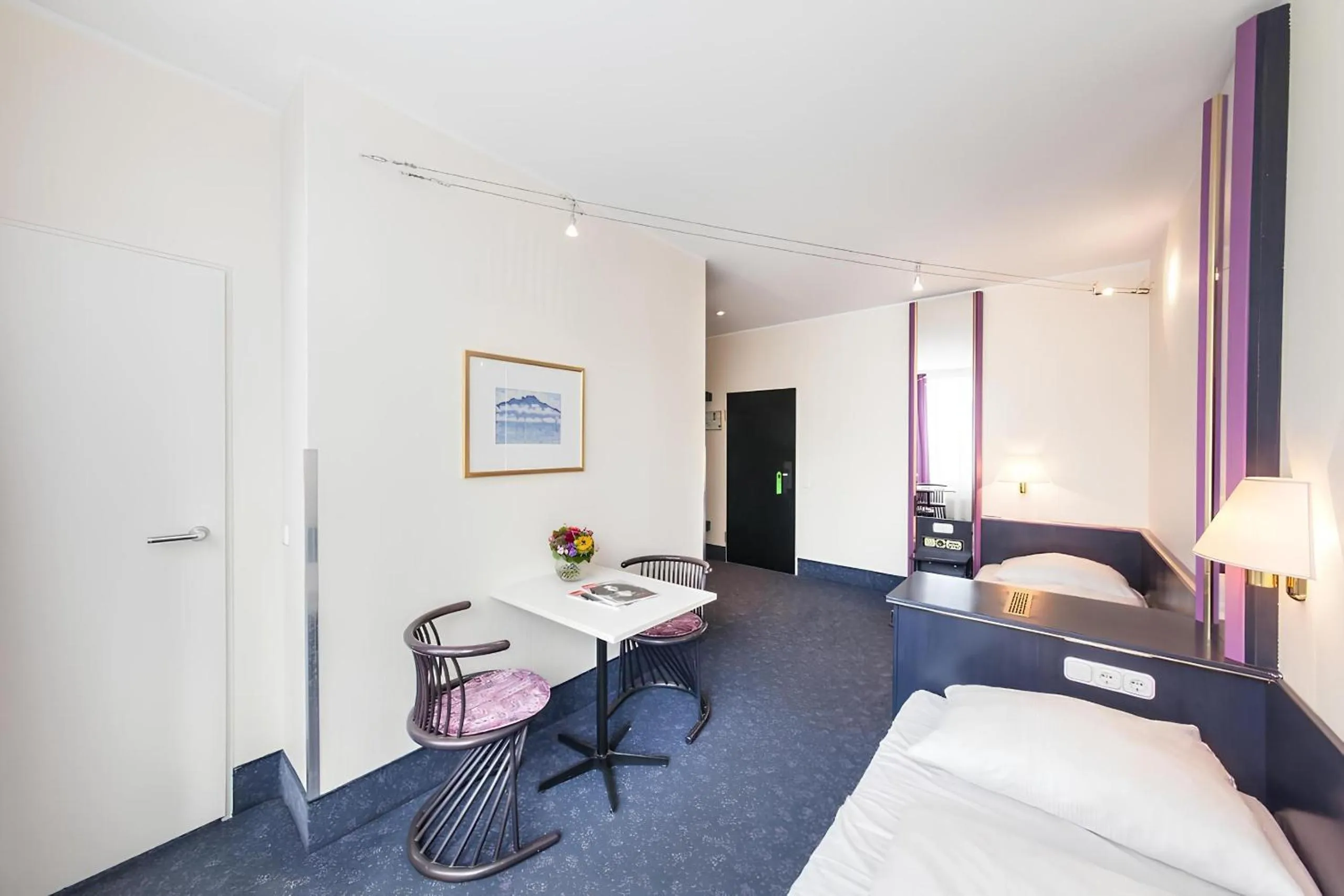 Bed in Hotel Mirage Düsseldorf-Neuss