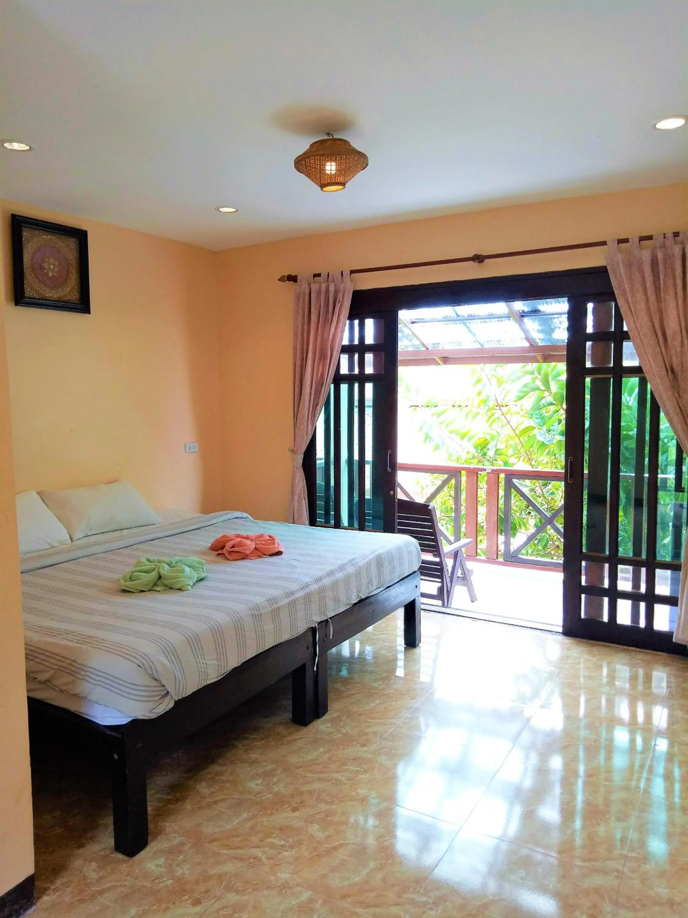 Bed in Banana Beach Resort