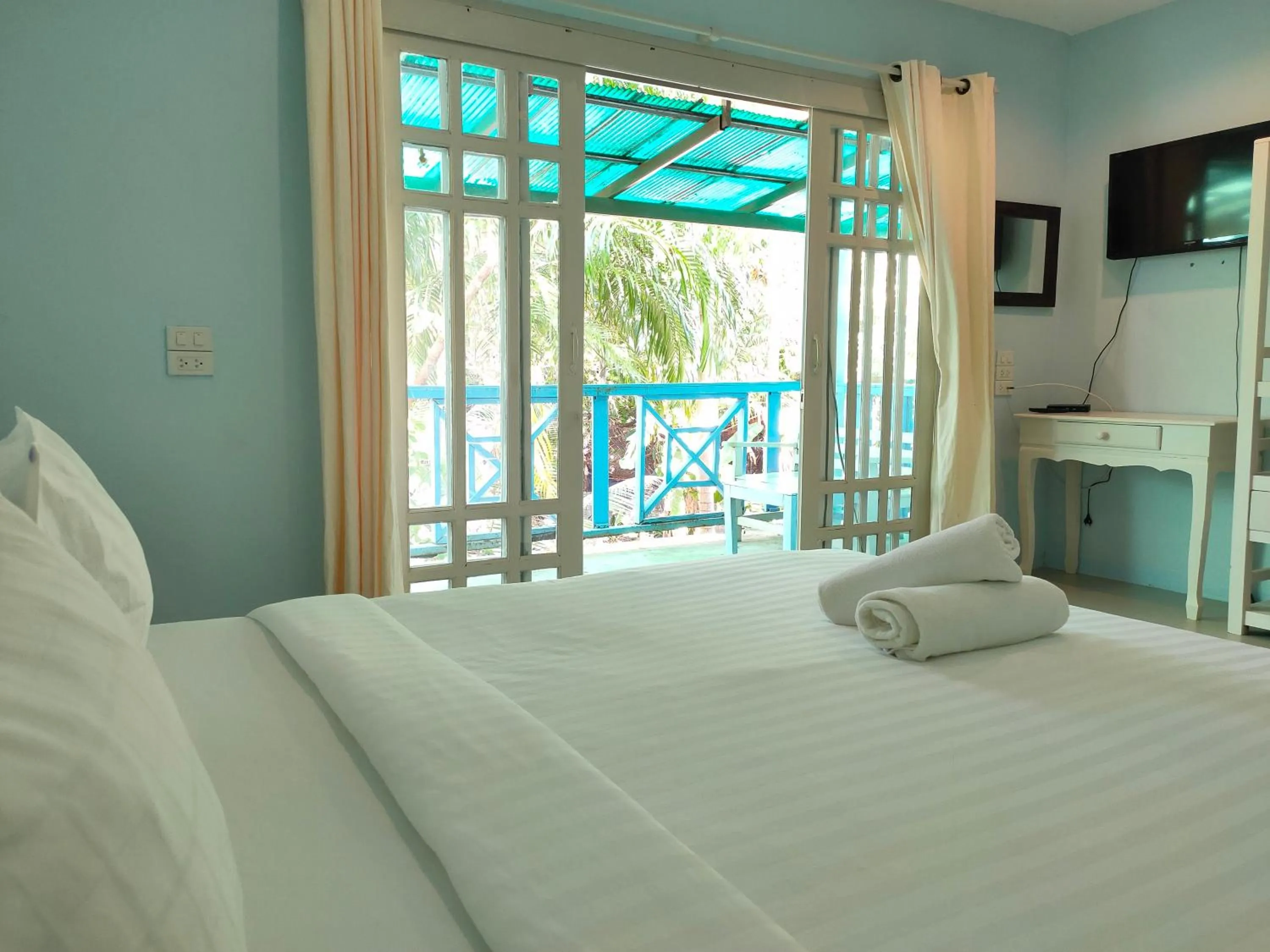 Bed in Banana Beach Resort
