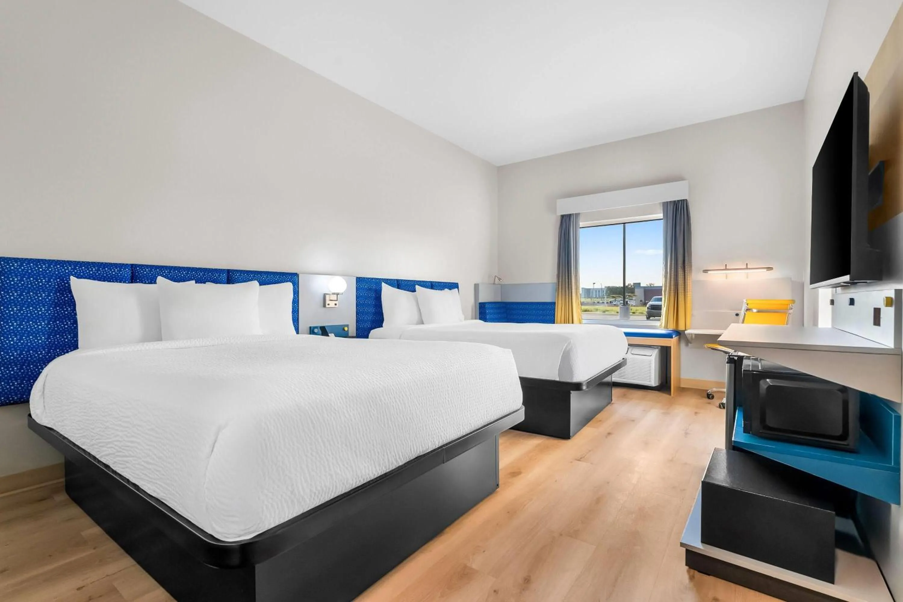 Bed in Microtel Inn & Suites by Wyndham Prattville Montgomery