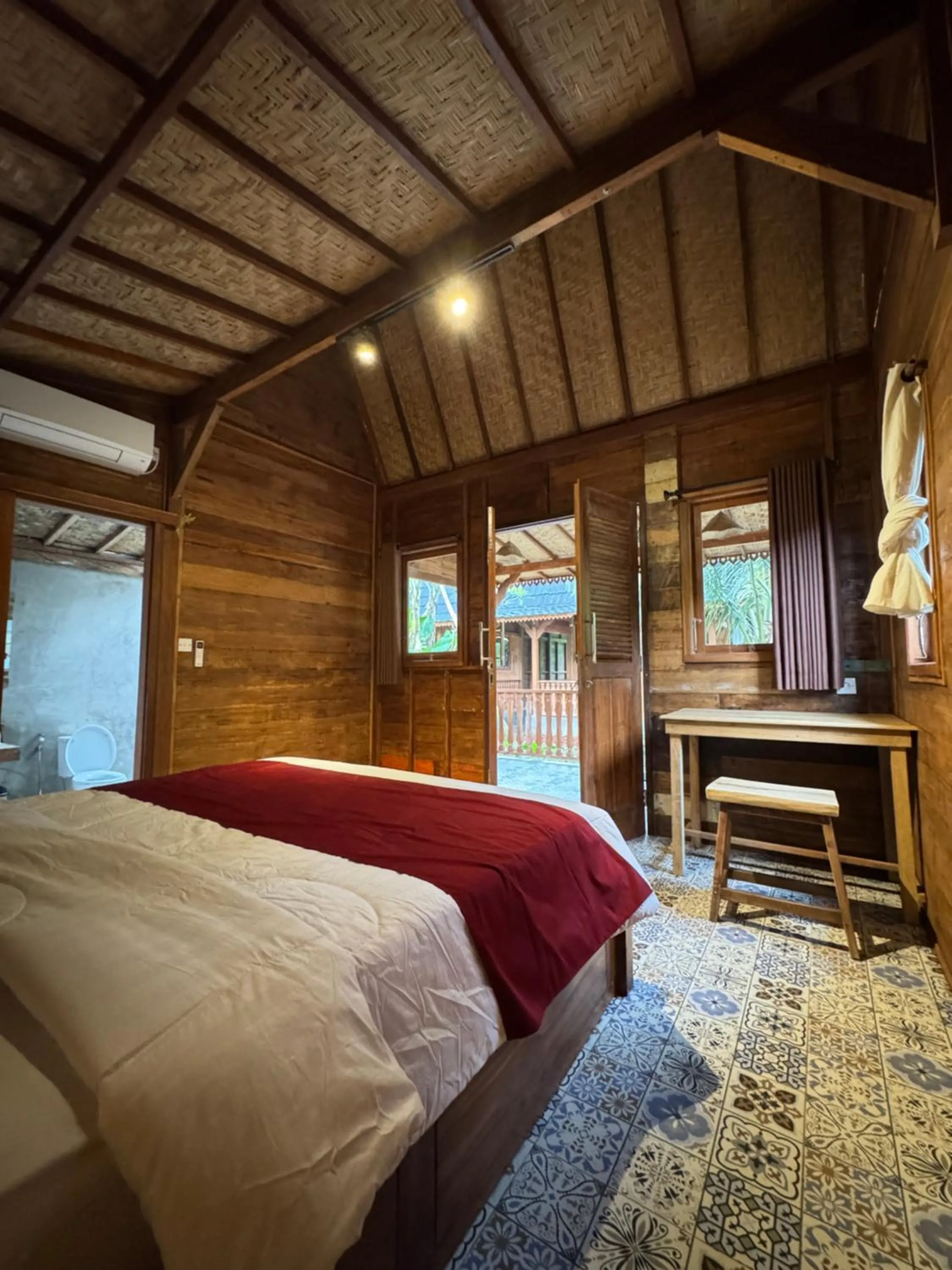 Bed in Oemah Kangin Homestay