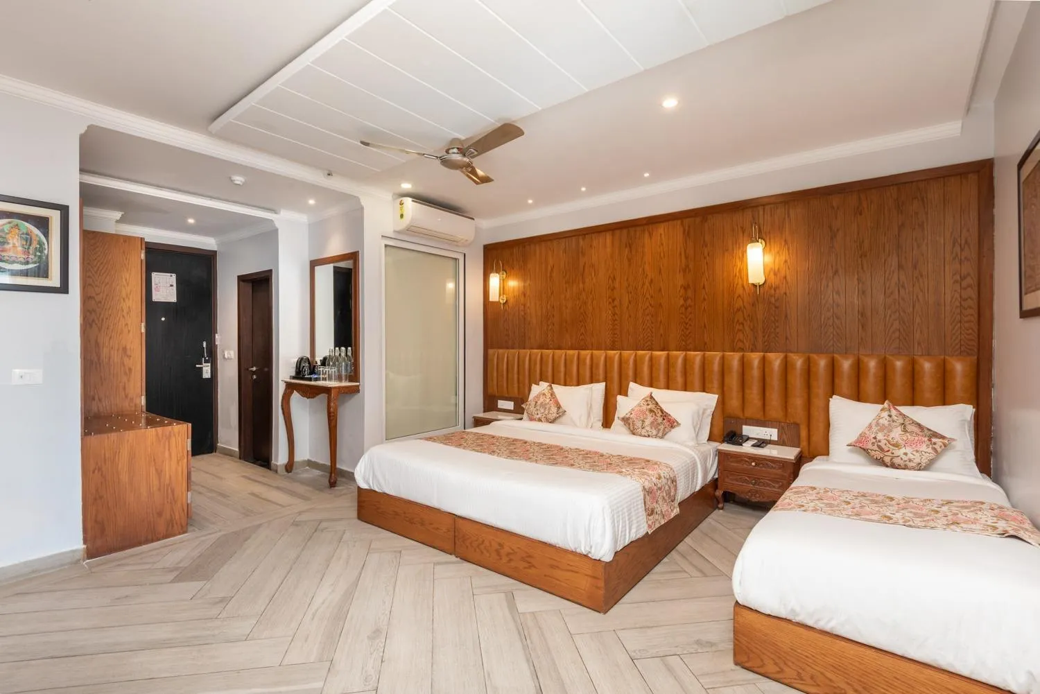 Bed in Quality Inn by Lawrence Hotels