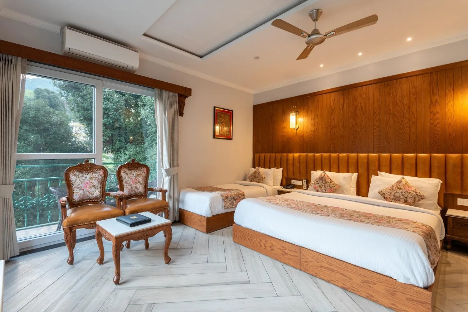 Bed in Quality Inn by Lawrence Hotels